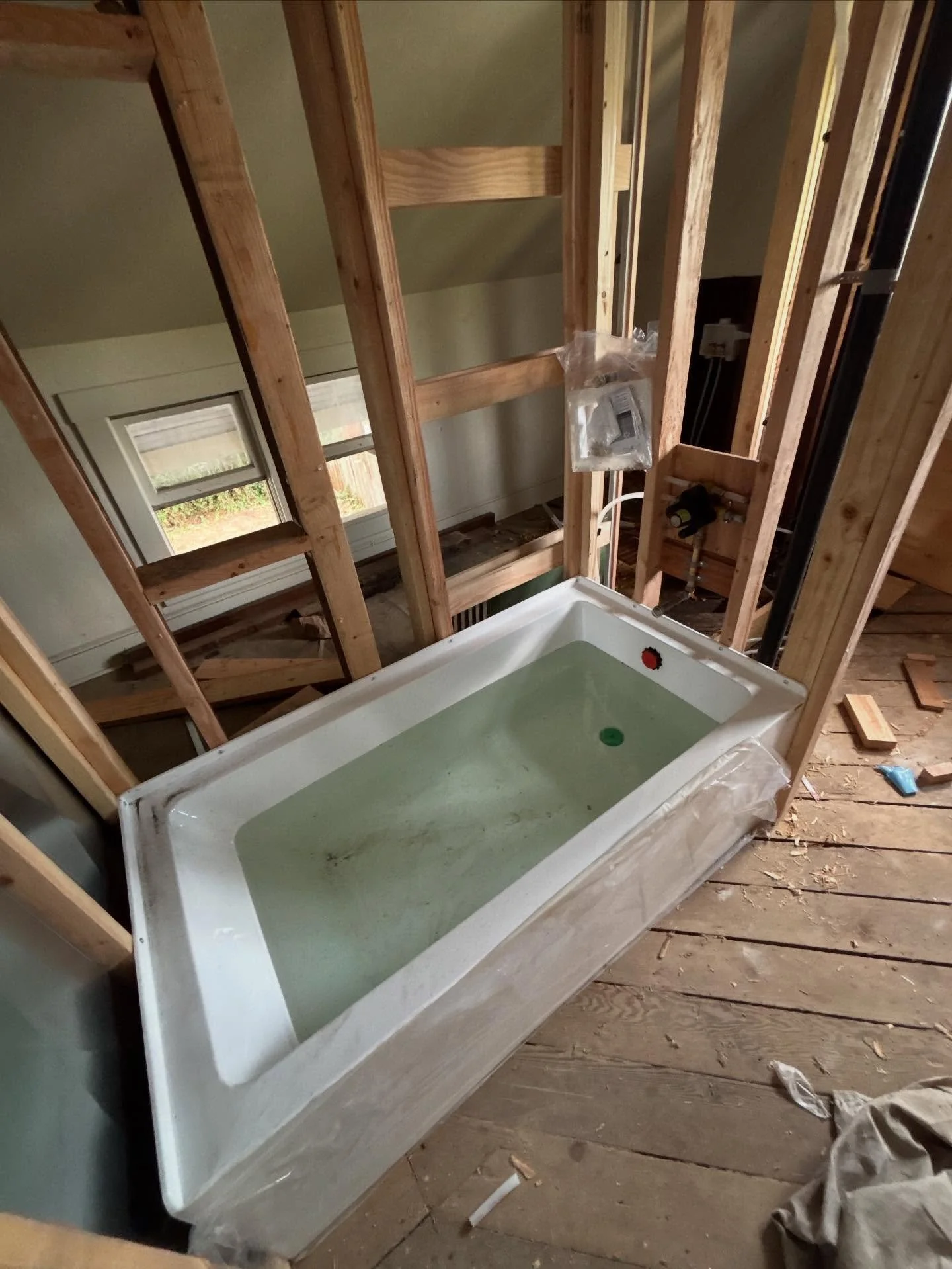 Let me explain. This tub full of water means 1 thing, we&rsquo;re ready for plumbing inspections. We&rsquo;re also ready for HVAC and Electrical inspections. 

Things are moving along and although I&rsquo;ve been removing wallpaper for what seems lik
