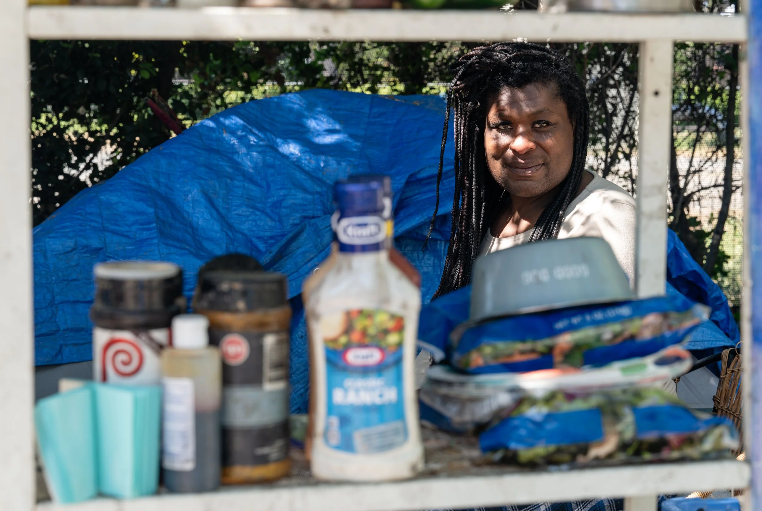 Kendra Greer, 33, poses for a portrait in front of her tent at a homeless encampment along Coyote Creek, also known as “Olinder” in San Jose, Thursday, April 2, 2026. | Thien-An Truong/For the S.F. Chronicle