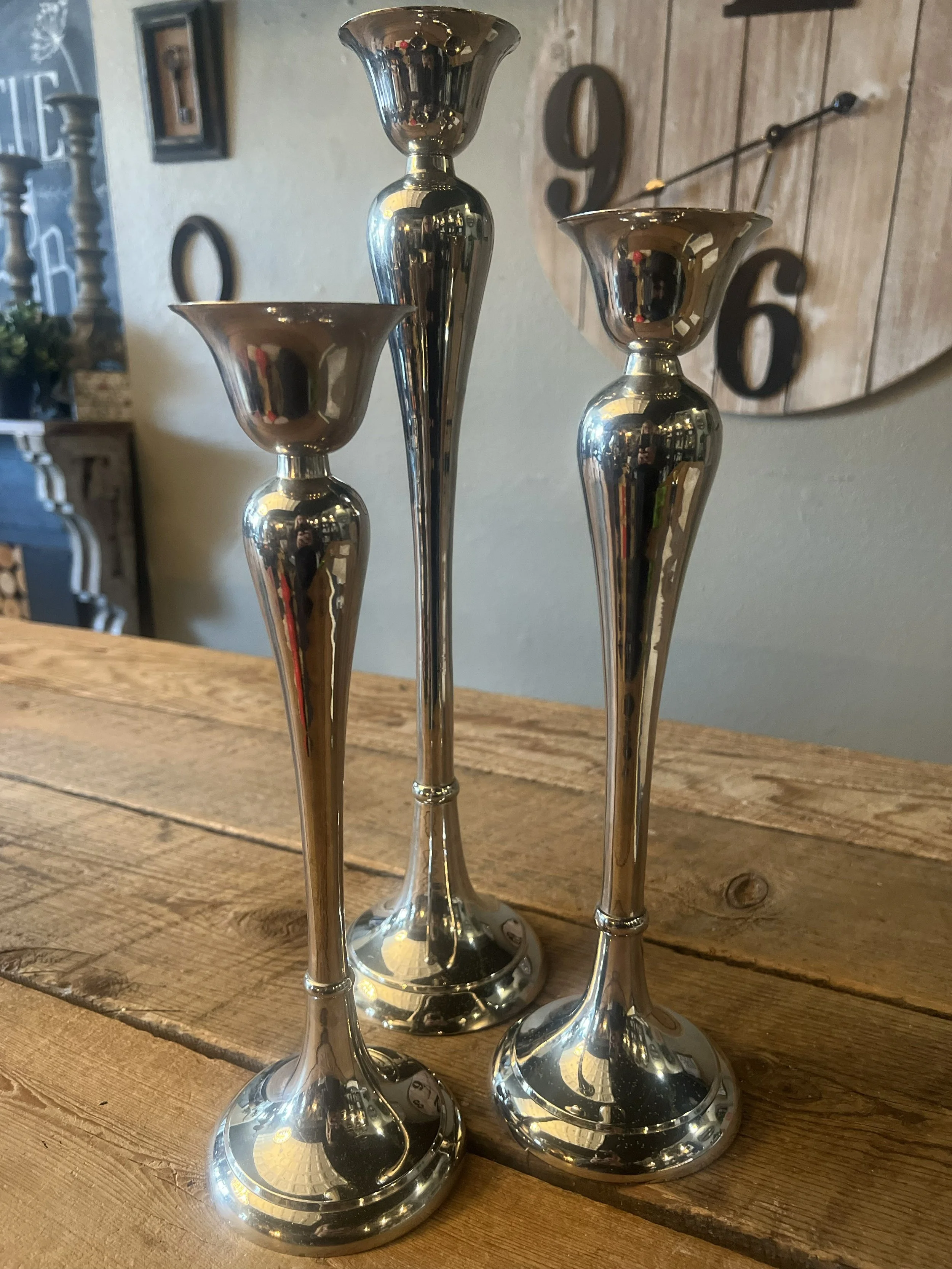 8 tall silver candlesticks.jpg