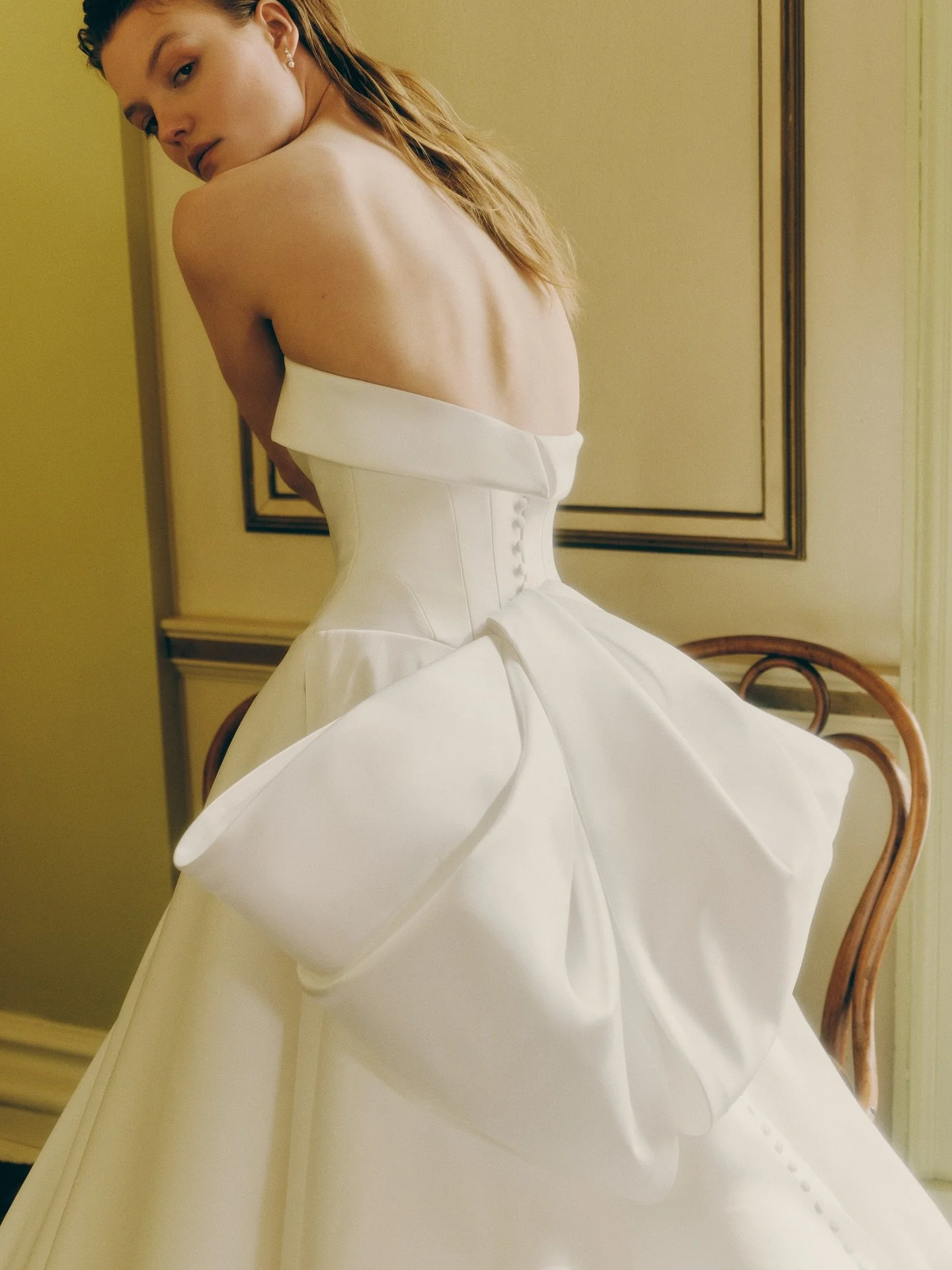 Meet WELLS 🤍Strapless Basque waist ballgown with a cuffed neckline and architectural seam-detailed bodice, elegantly finished with a luxurious bow at the back and buttons to hem.

The dress of your dreams is waiting for you!&hellip; Book your appoin