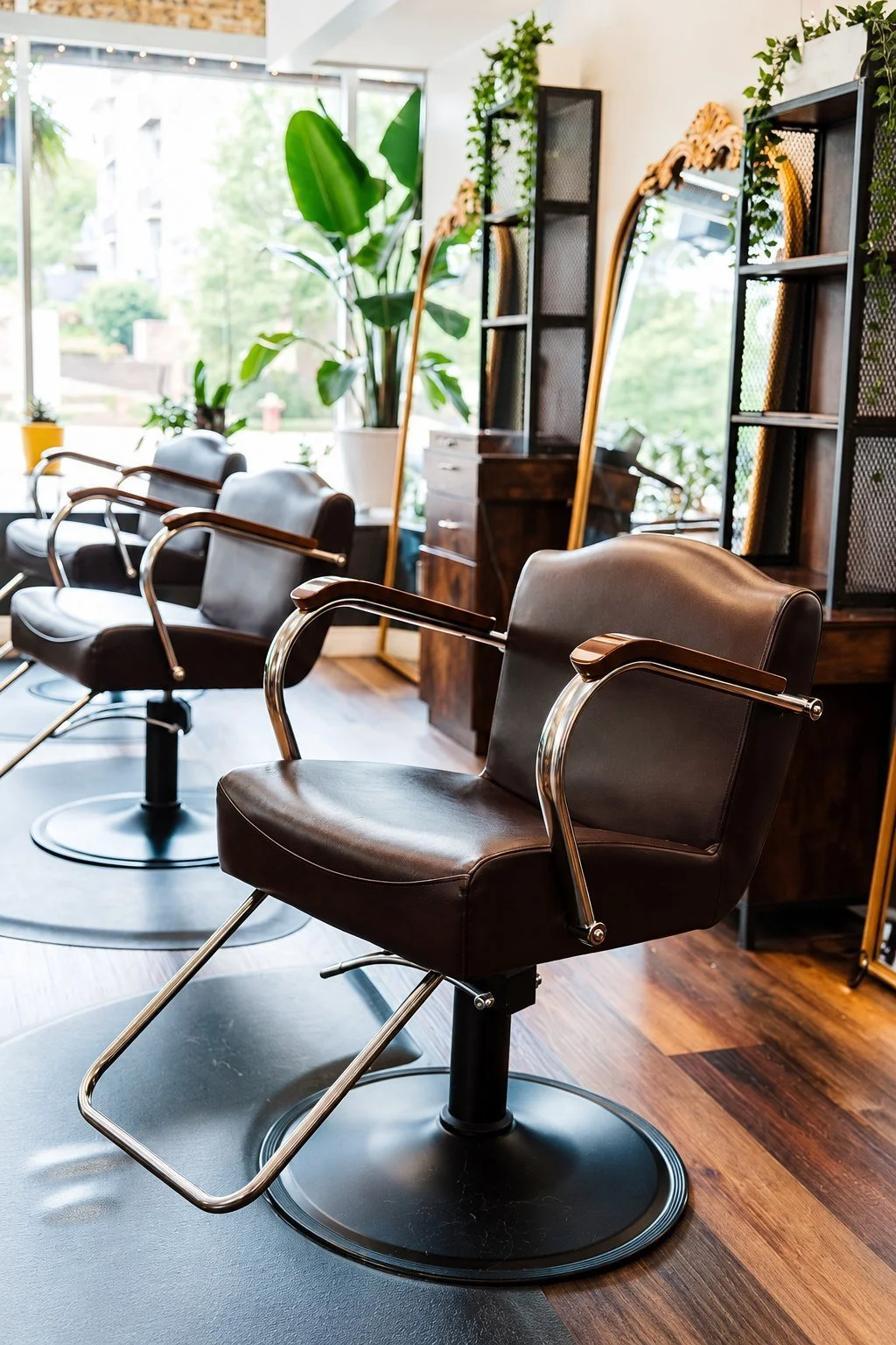 Styling chairs and ornate mirrors at Mechanix + Co. in West Saint Paul.
