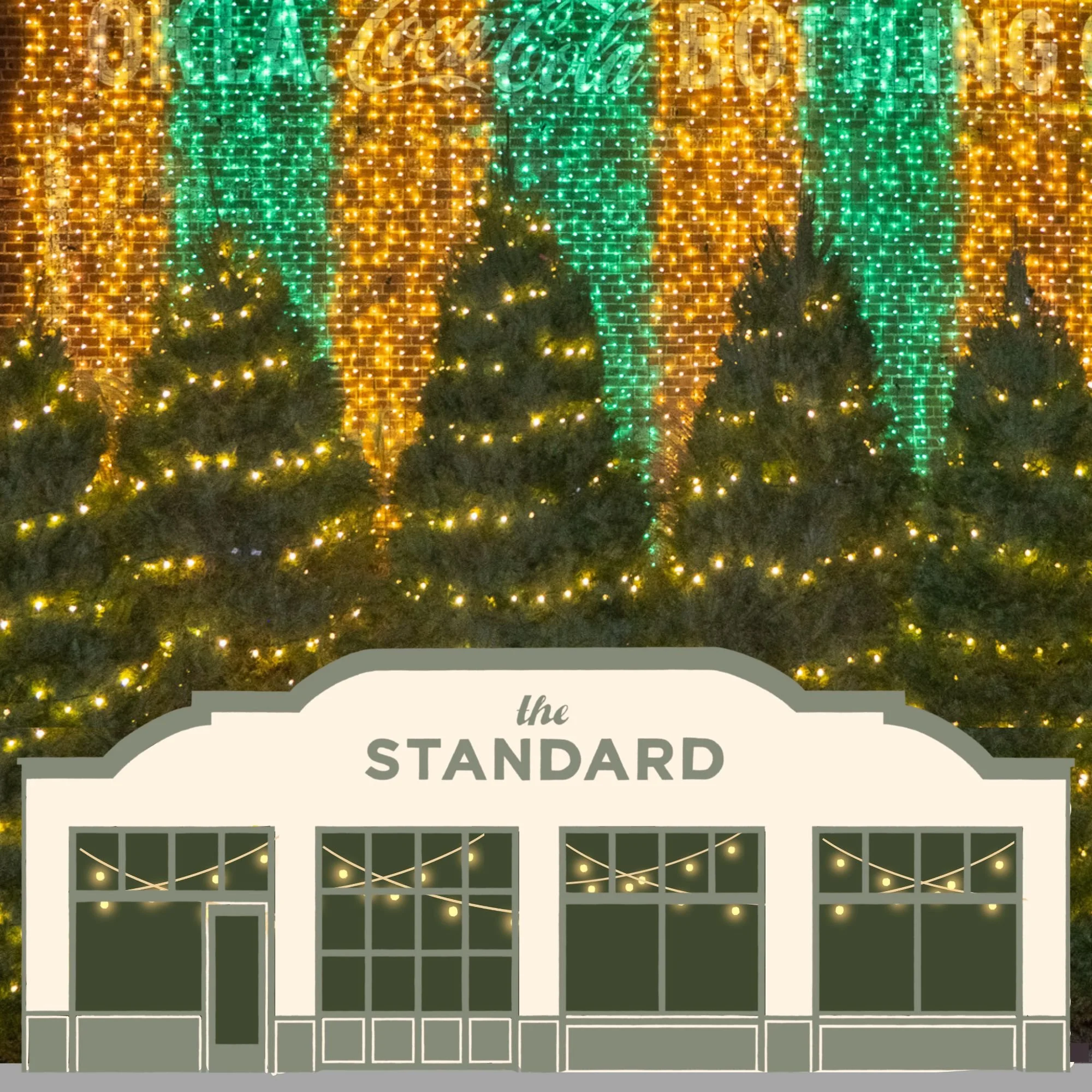 Decorative holiday display with green and gold lights and trees in front of a building labeled 'The Standard' decorated with string lights.