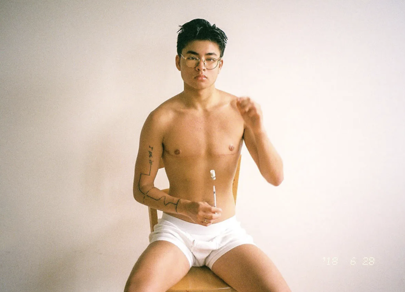 chella holding a testosterone shot at nineteen