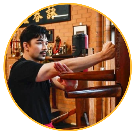 Students practicing Wing Chun techniques during martial arts training