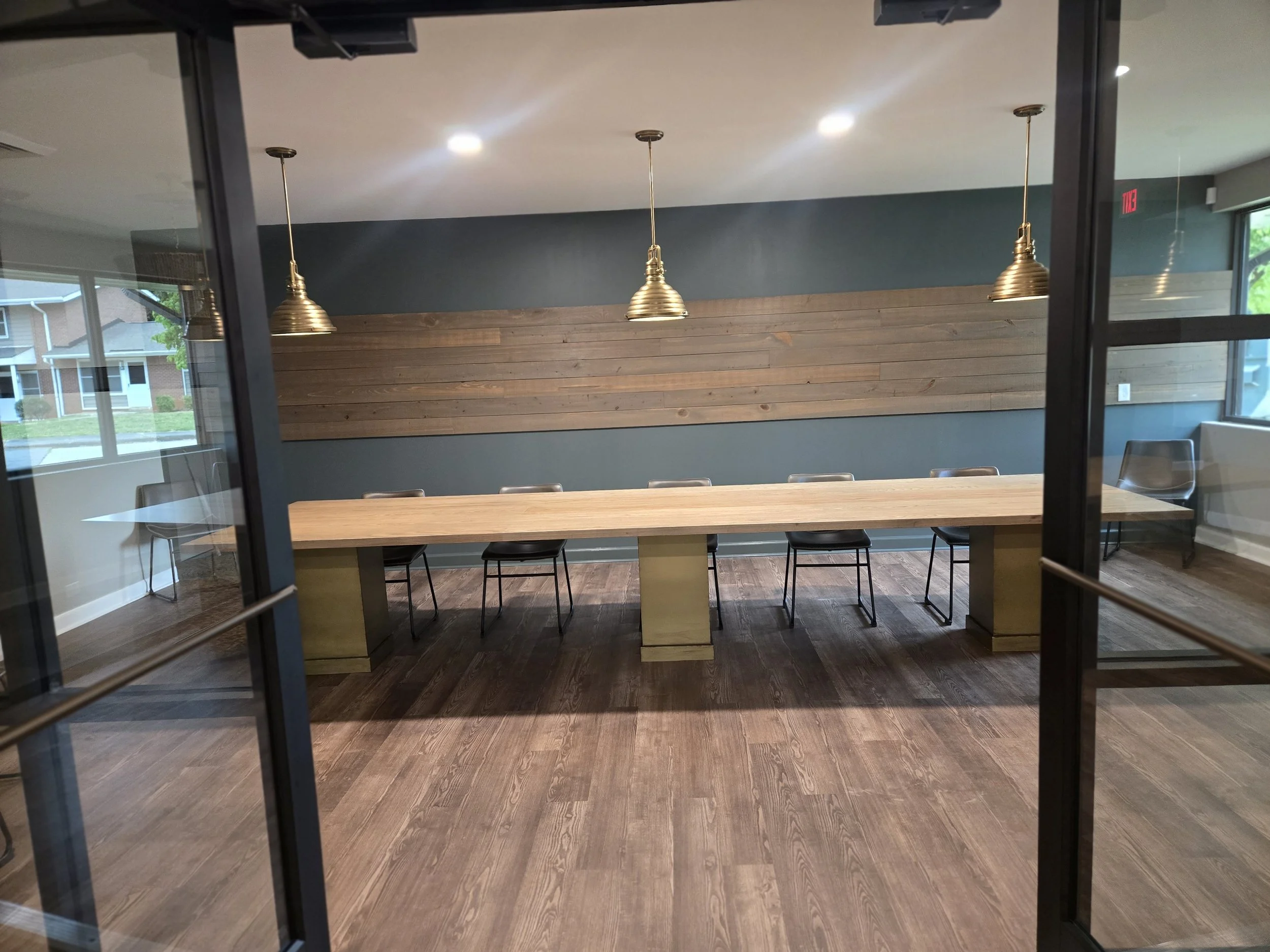 Custom table with powder coated pedestals. 