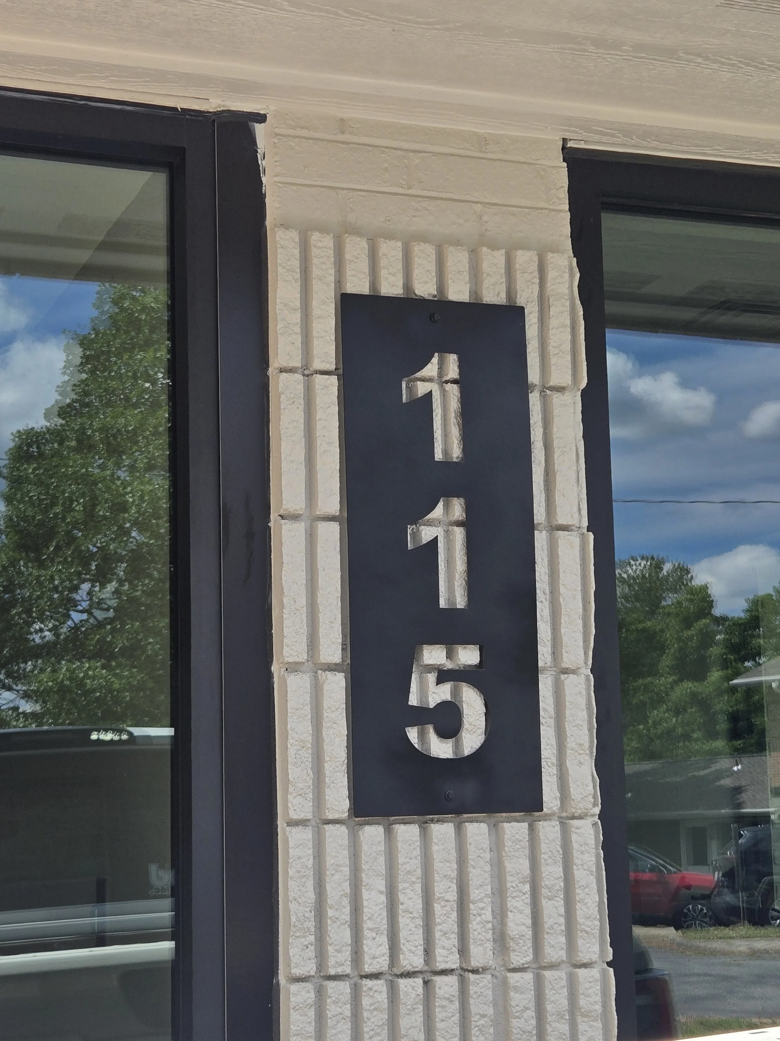 A custom metal address sign. 