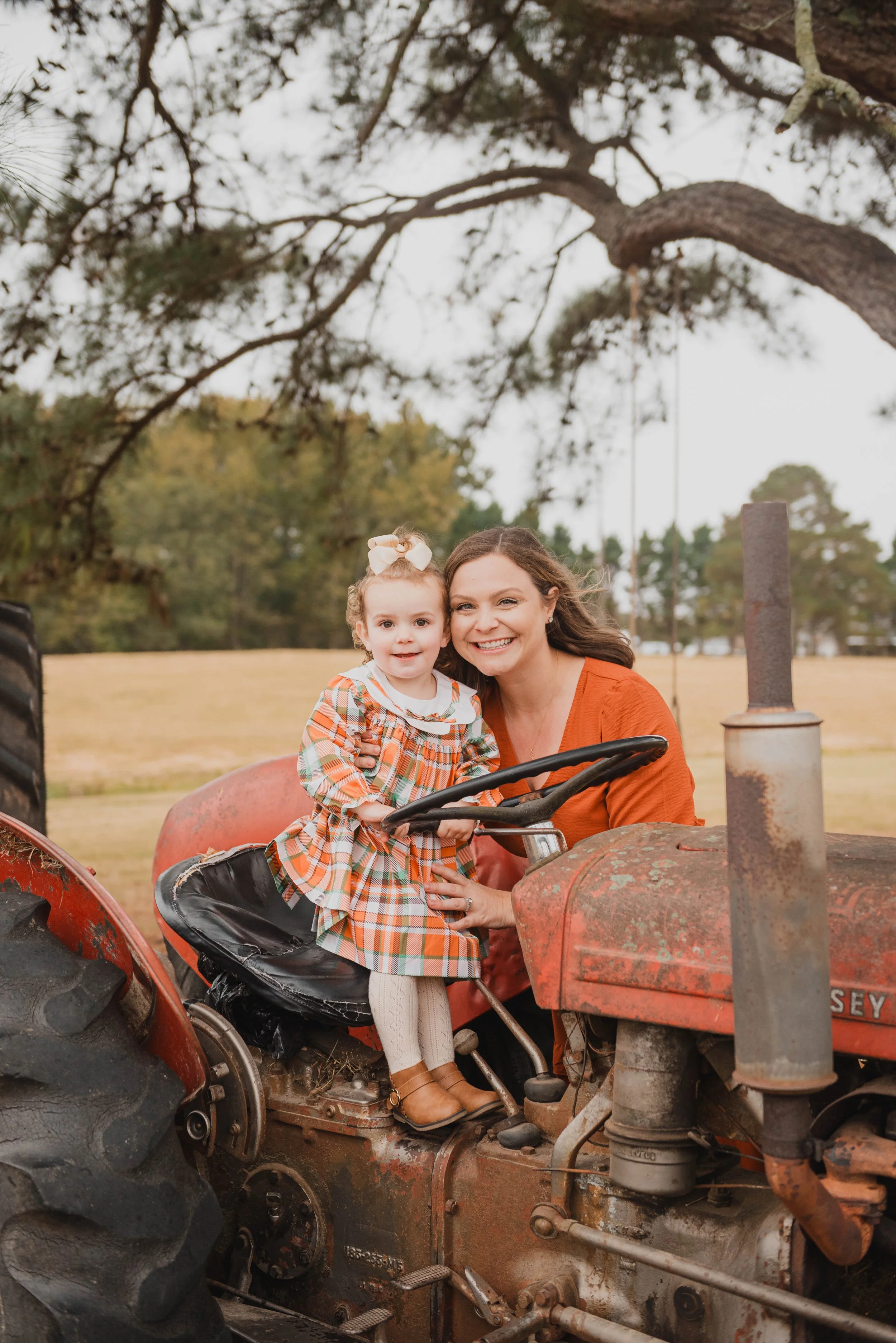 Outdoor lifestyle session by a Photographer in Johnston County, NC capturing natural interaction across open scenery