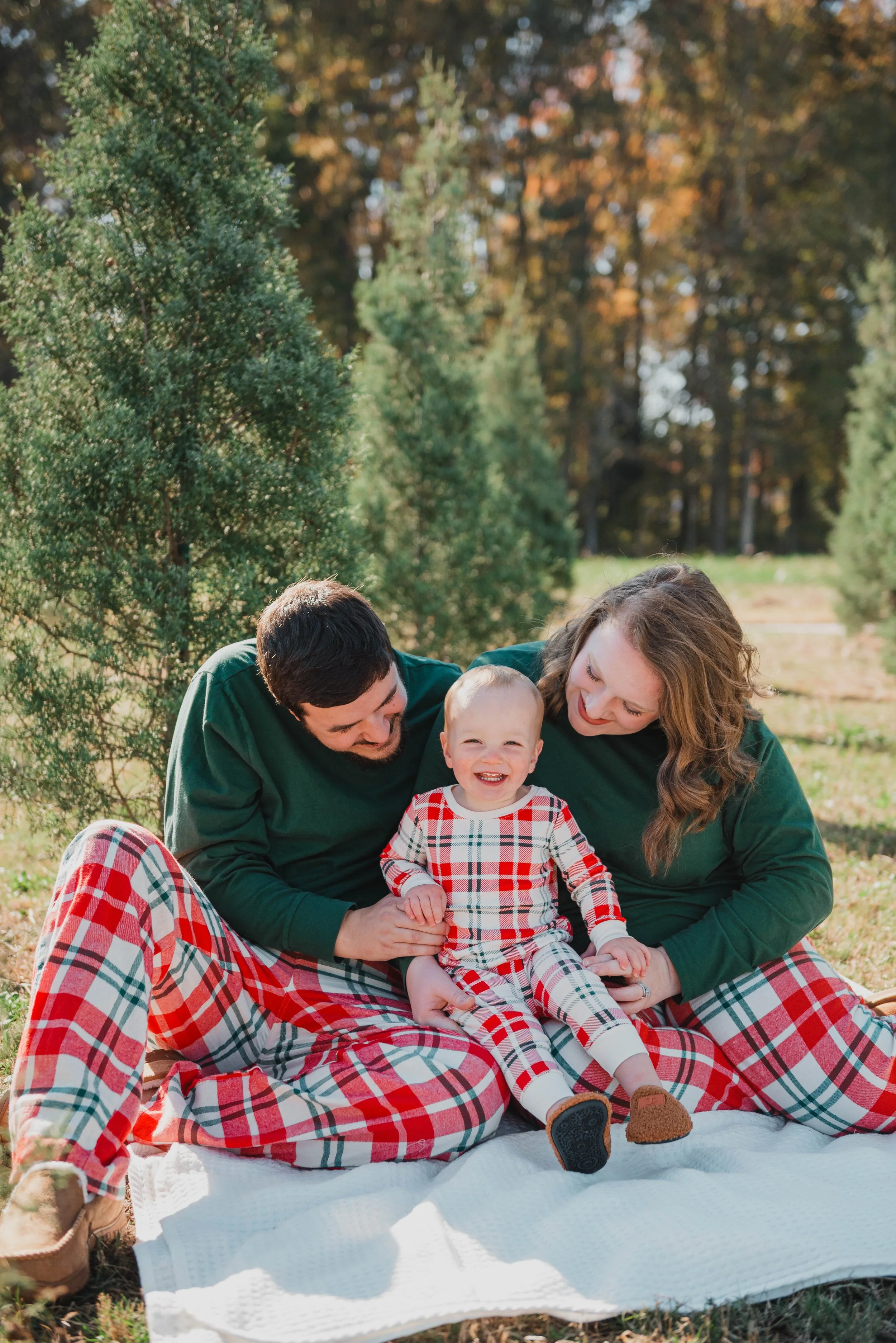 Photographer in Zebulon, NC capturing a portrait session with natural outdoor lighting