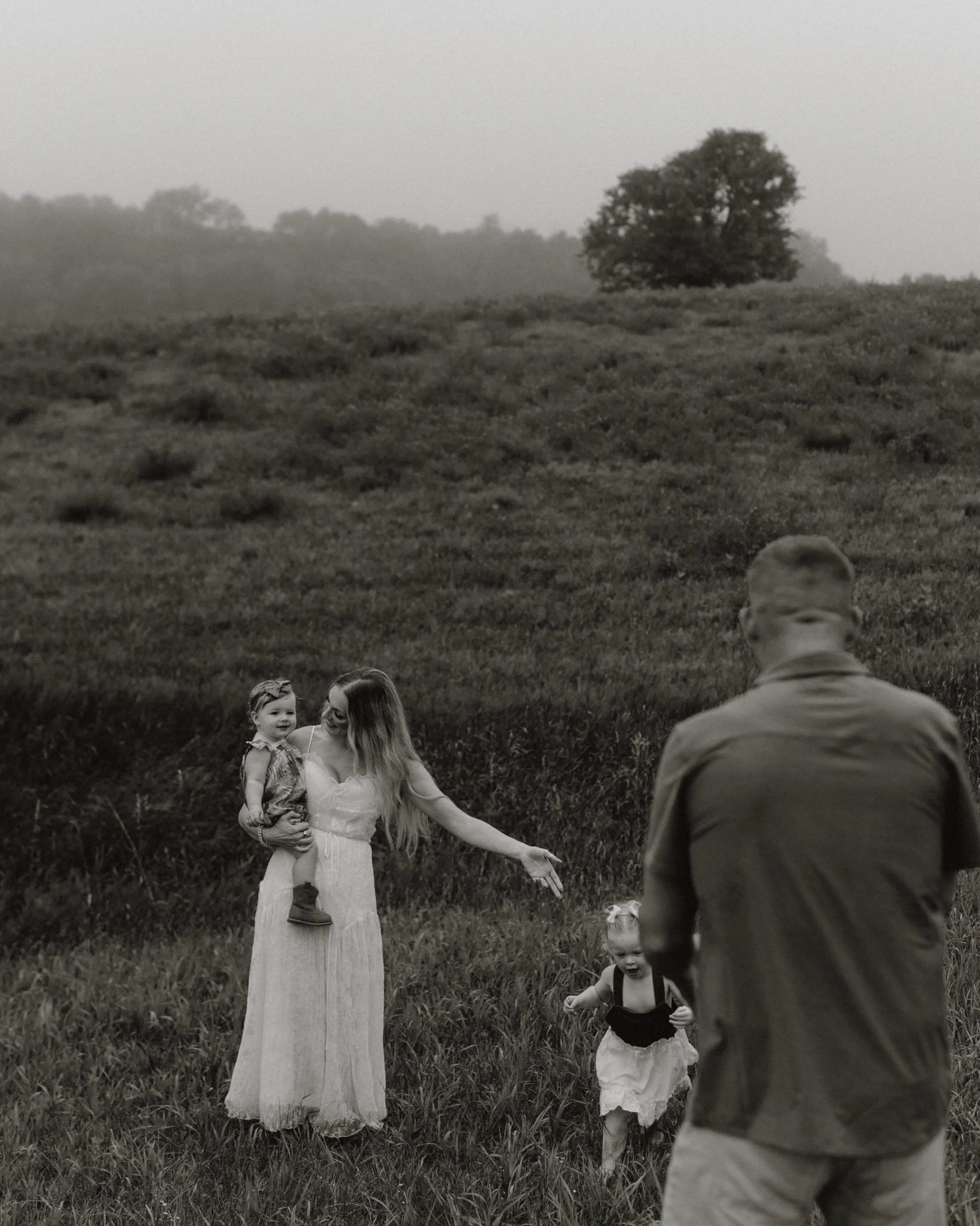 I hope they remember their childhood feeling a little bit like this. Wild grass, summer air, mama close, daddy chasing after them, and nowhere else they needed to be. 🤎