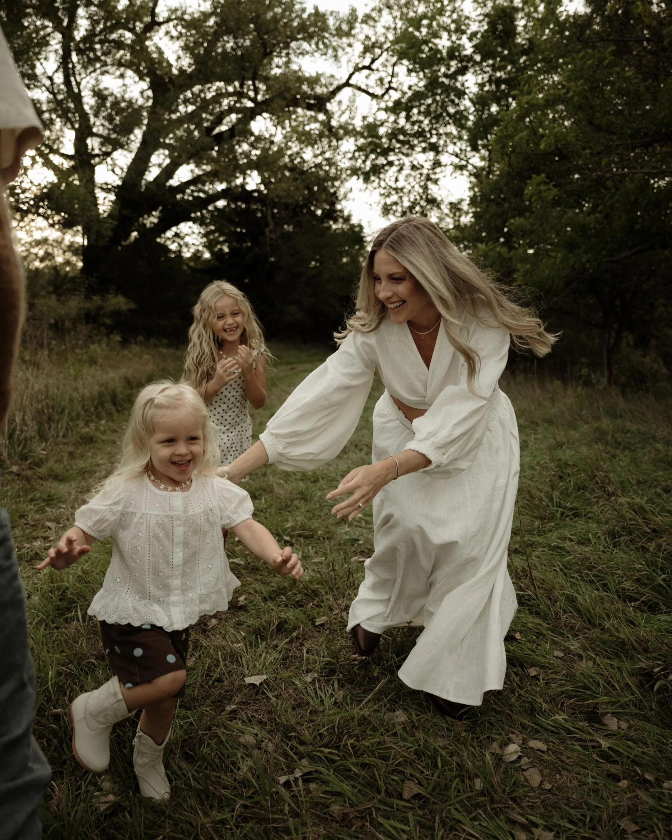 We spent the evening running through pastures, chasing little legs, laughing until our cheeks hurt, and soaking up this sweet season of their story.

Getting to photograph a family as they grow is one of the greatest gifts of this job. And these litt