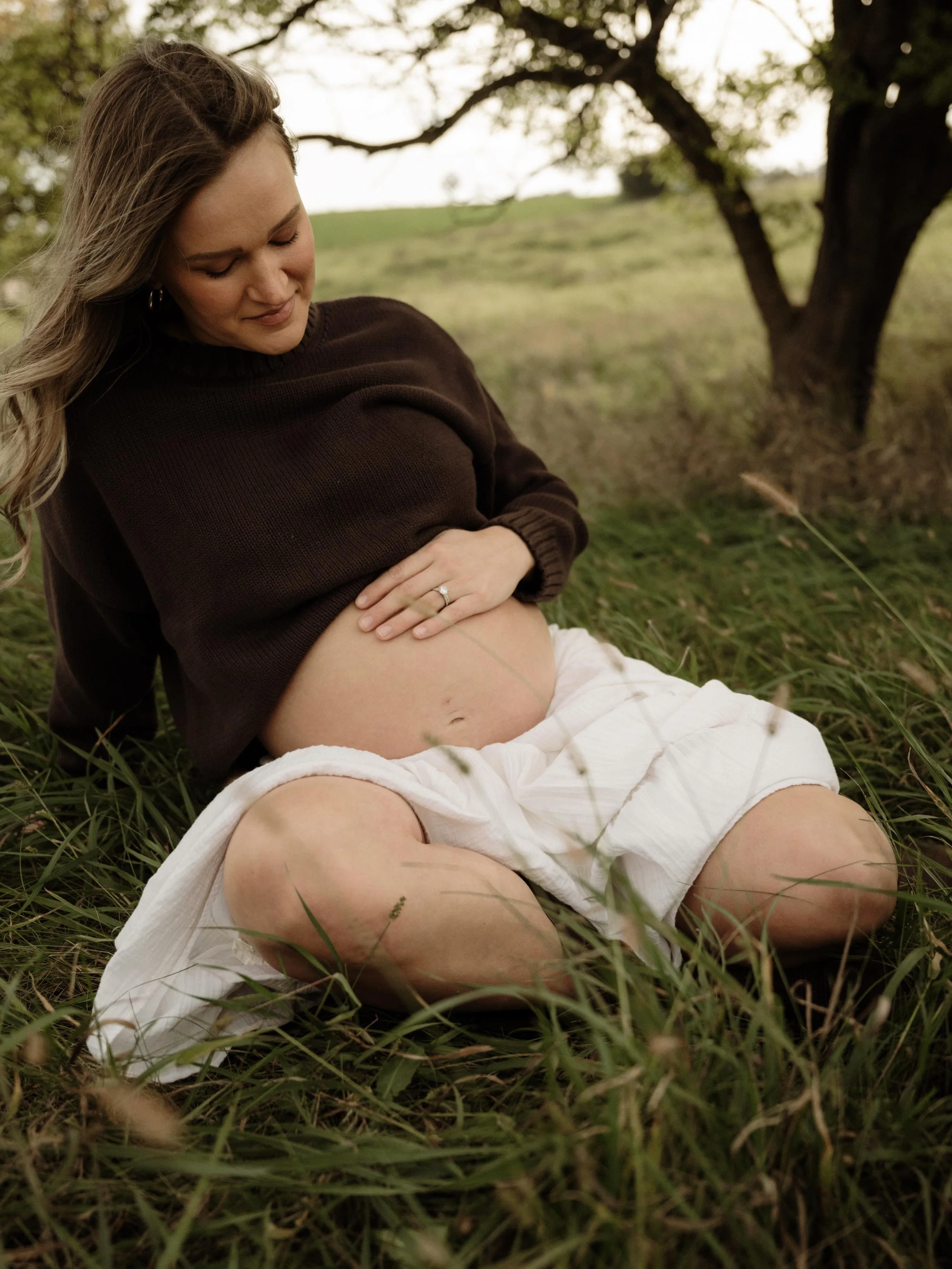 I think about how one day, this little one will sit and look through these photographs, just like my own girls love to flip through their baby books.

They&rsquo;ll see the way their mama looked carrying them, the way their family waited for them, an