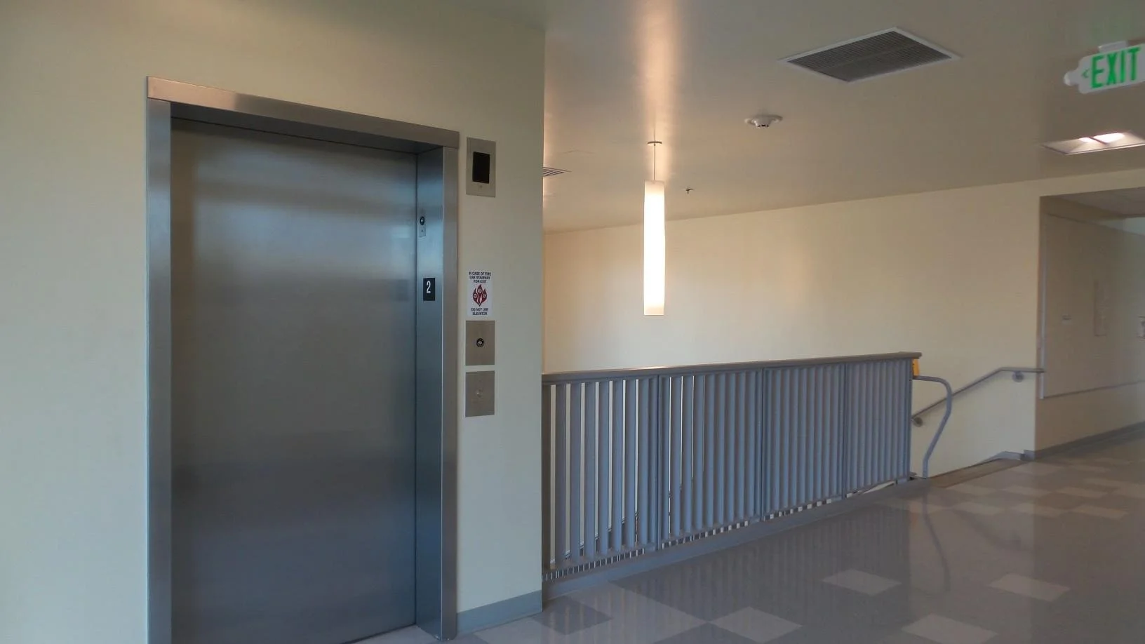 Oranssi technician working on a roof project