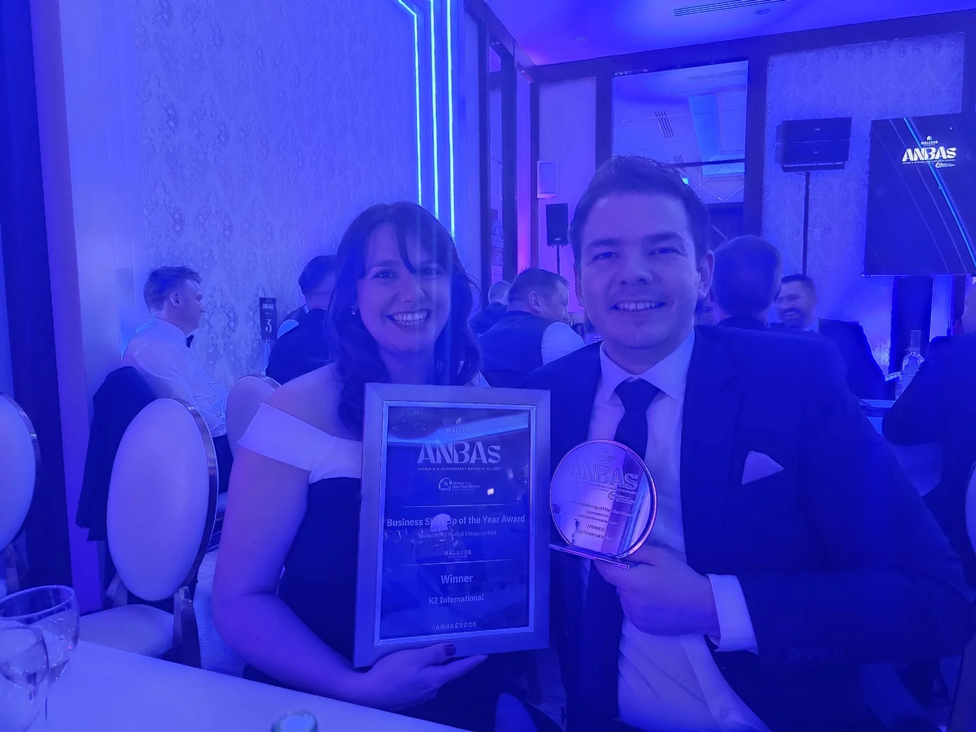 Winners of the Business Start-up of the Year award, K2 International, show off their trophy and plaque