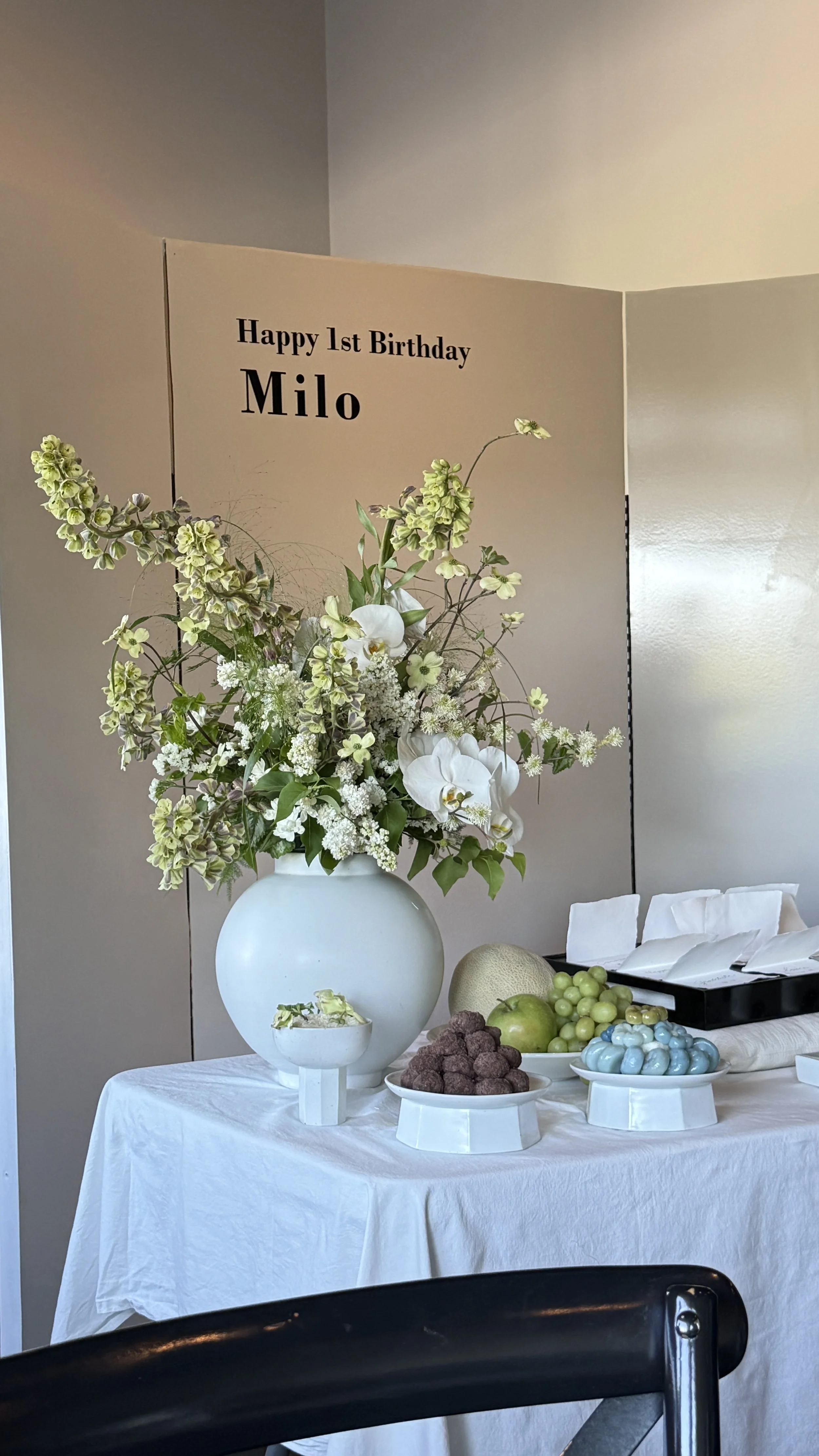 Moon-jar centerpiece for 1st birthday event, Dohl, in Seattle. Arranged by Sweet Pea & Vine.