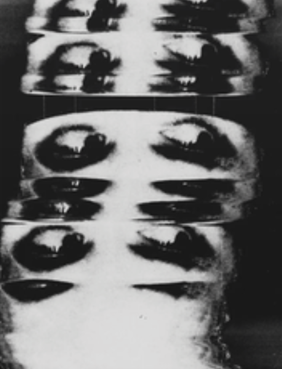 Repeated black-and-white images of closed eyes with long eyelashes, distorted with a glitch effect.