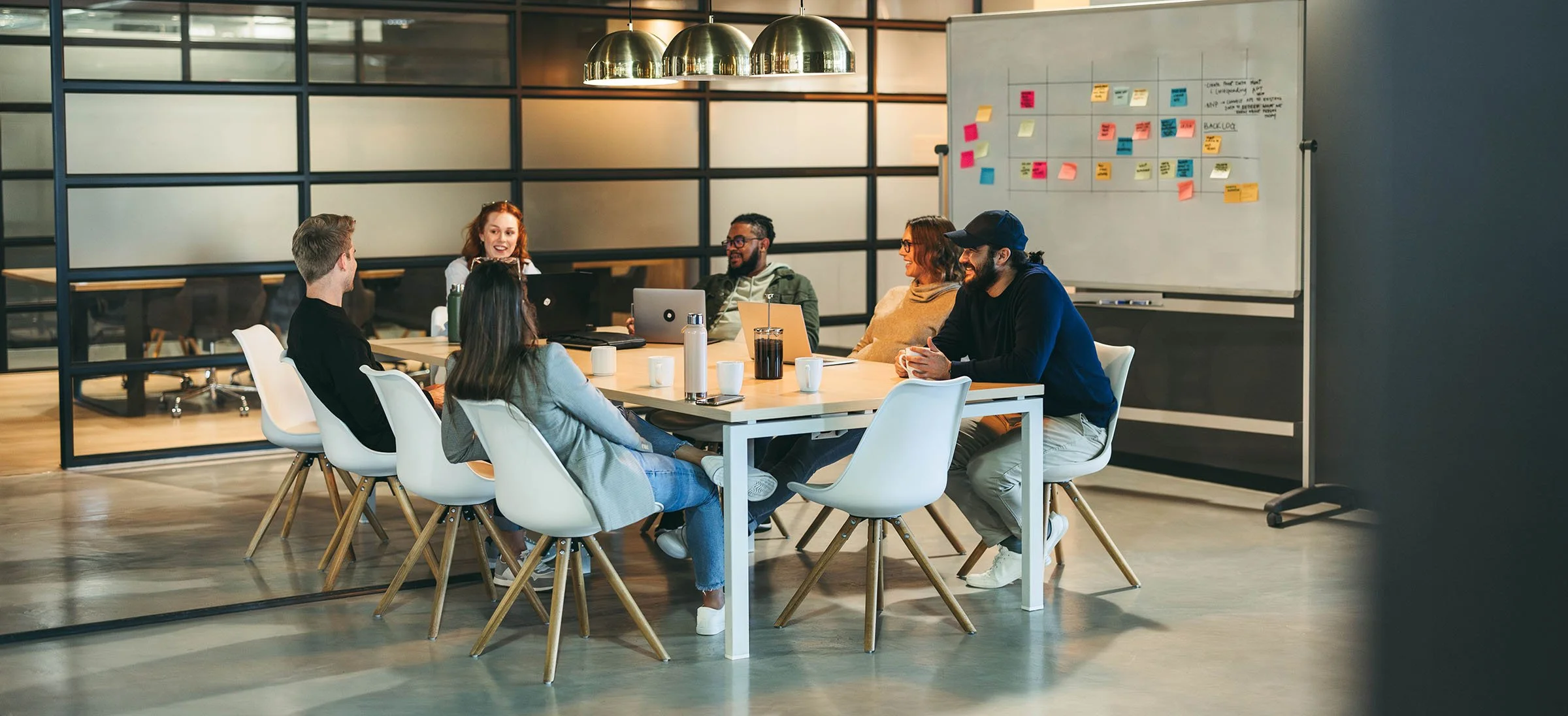Modern, brightly lit room set up for a comfortable focus group discussion