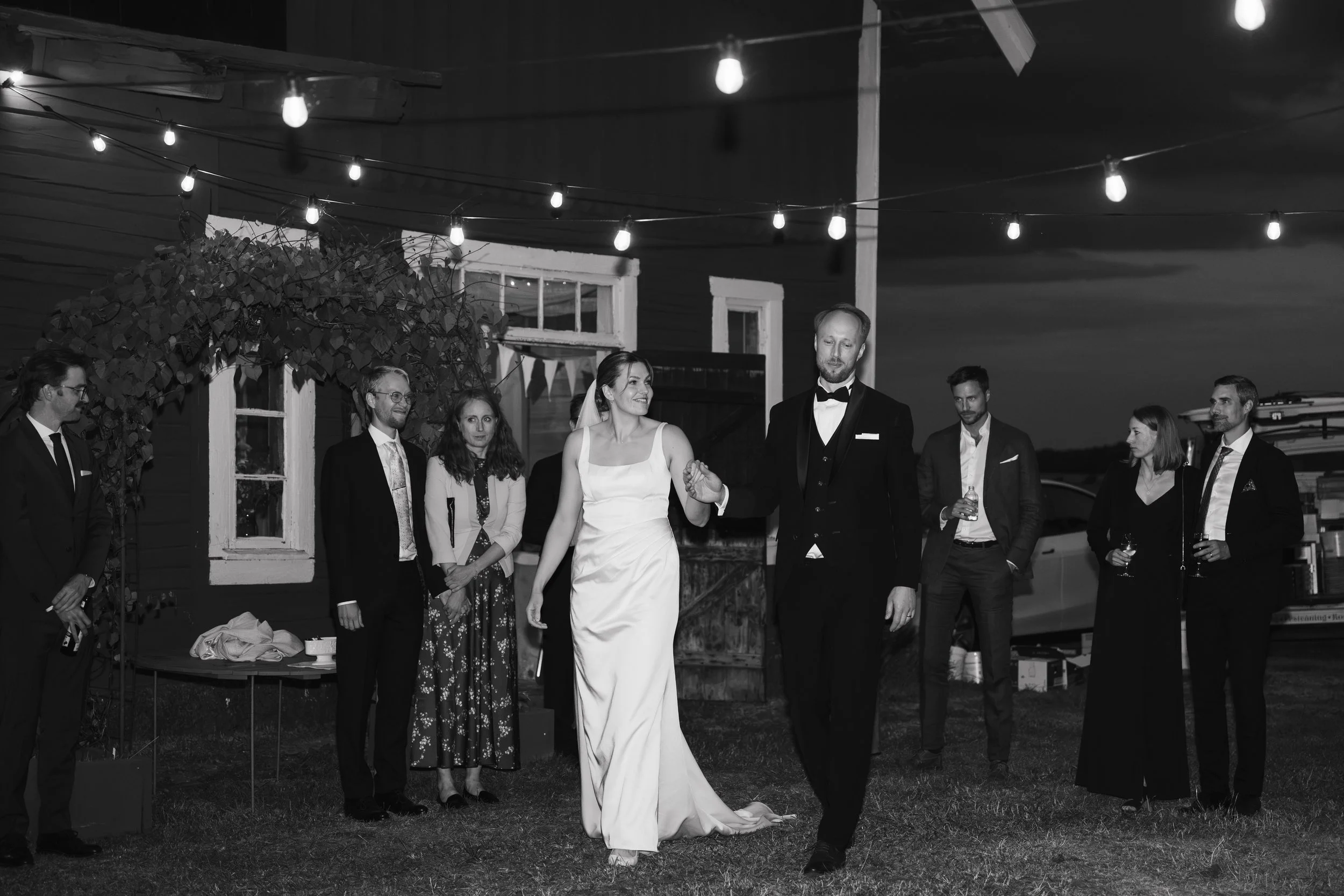 Jemina Smith Photography - Wedding - Elopement -Kiss - Black and white - flowers in hair - floral suit - non traditional wedding dress and suit - bride and groom - love