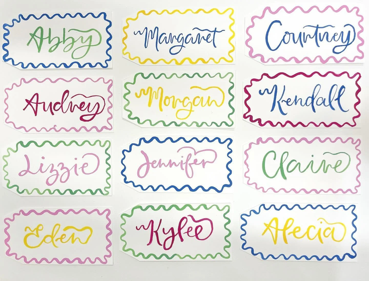 If you ask us, squiggly place cards always make a dinner party more fun💁&zwj;♀️💁&zwj;♀️💁&zwj;♀️

#placecards #weddingstationery #2024bride #customweddingstationery #weddingideas #weddingcalligrapher #dinnerparty #weddinginvitations  #watercolorart