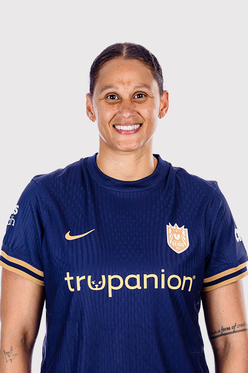 Reign FC forward Lynn Biyendolo in reflection kit