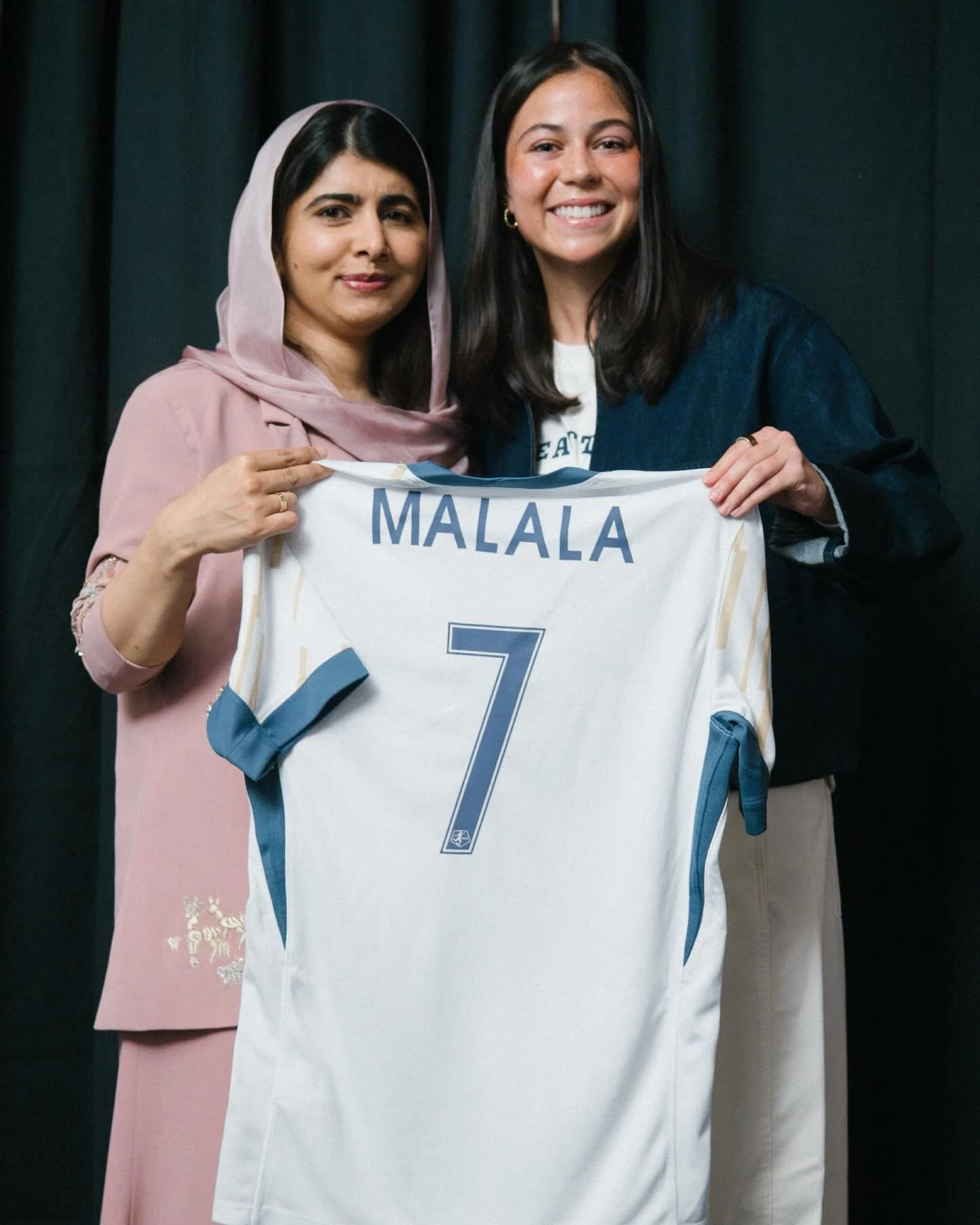 An honor to welcome @malala to Seattle and gift her a custom Reign kit during her visit. Grateful for the chance to celebrate a leader whose courage and advocacy continue to inspire girls and women worldwide. Proud to stand with women who move our ci