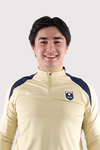 Jae Ryding in Golden top with reign logo