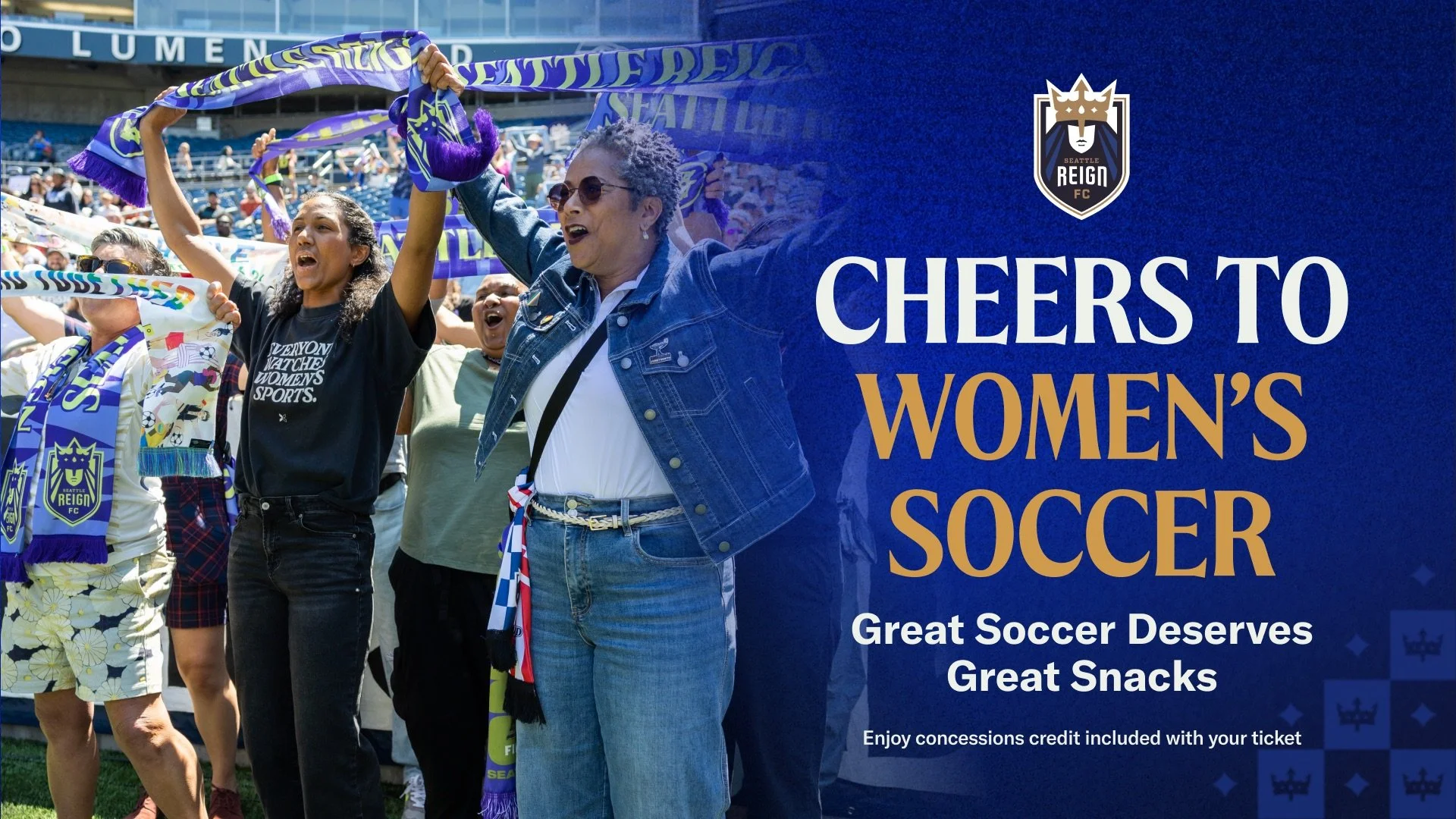 People at Reign FC match holding scarves up