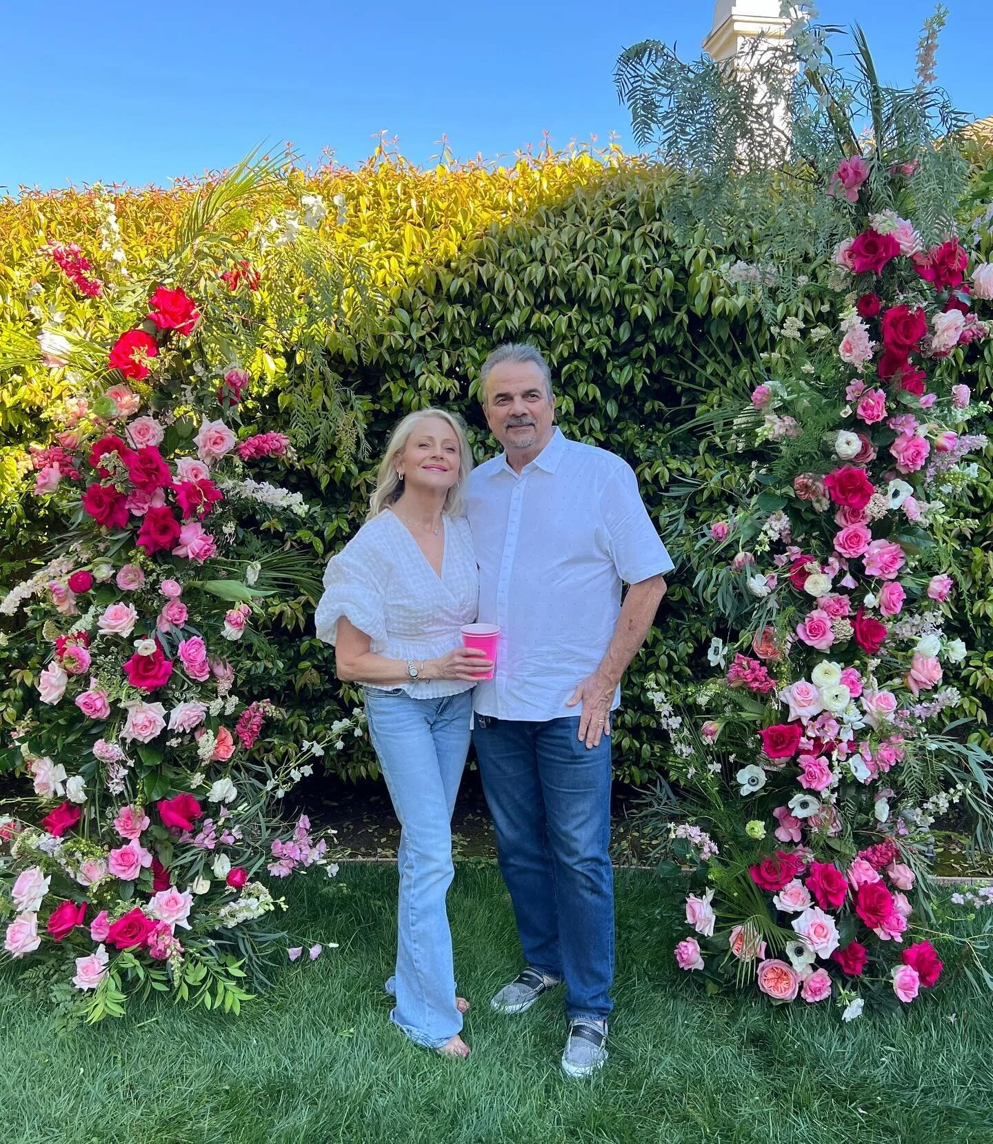 my cute parents in front of the split arch I did for my aunt&rsquo;s 60th birthday party! 💗🌸🌷 felt so amazing to spoil my aunt and make her feel special on her birthday!