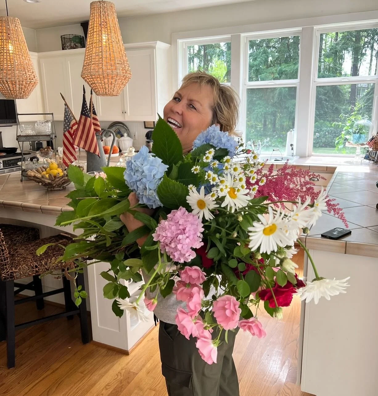 meet my beautiful momma connie that I call my &ldquo;Washington Mom&rdquo;! She showed me the world of flowers 🌷🌻 Can you believe all of these flowers are from her backyard?! I don&rsquo;t know where my life would be without her. She is one of my b