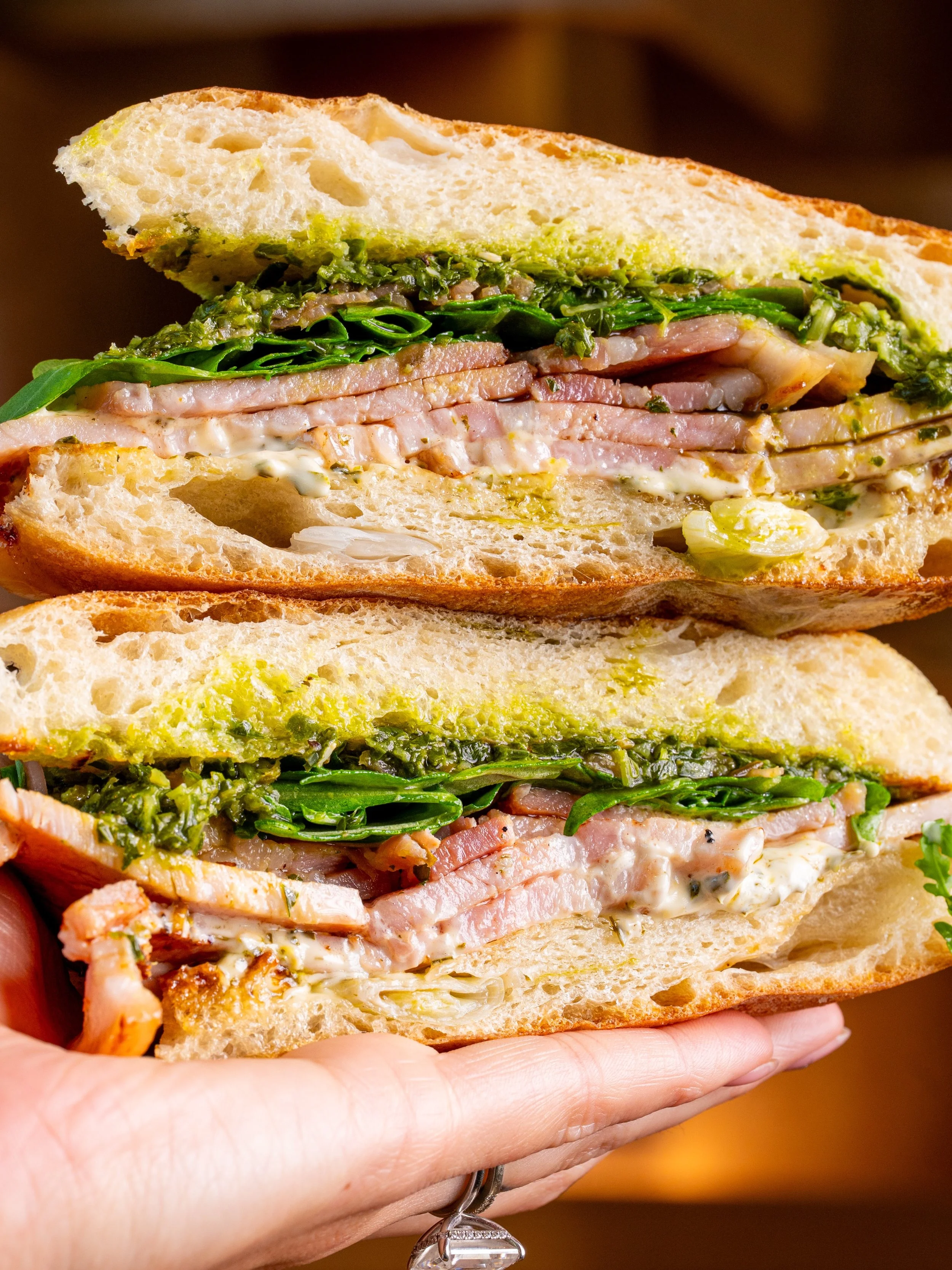 Everyone, meet Porchetta 💚

She&rsquo;s fresh, she&rsquo;s flavorful and she&rsquo;s now a regular on the Acorn Favs menu. 

Porchetta Verde Sando: Herb-Roasted Porchetta, Salsa Verde, Pickled Shallots, Arugula, Lemon Aioli, Toasted Onion Loaf, with