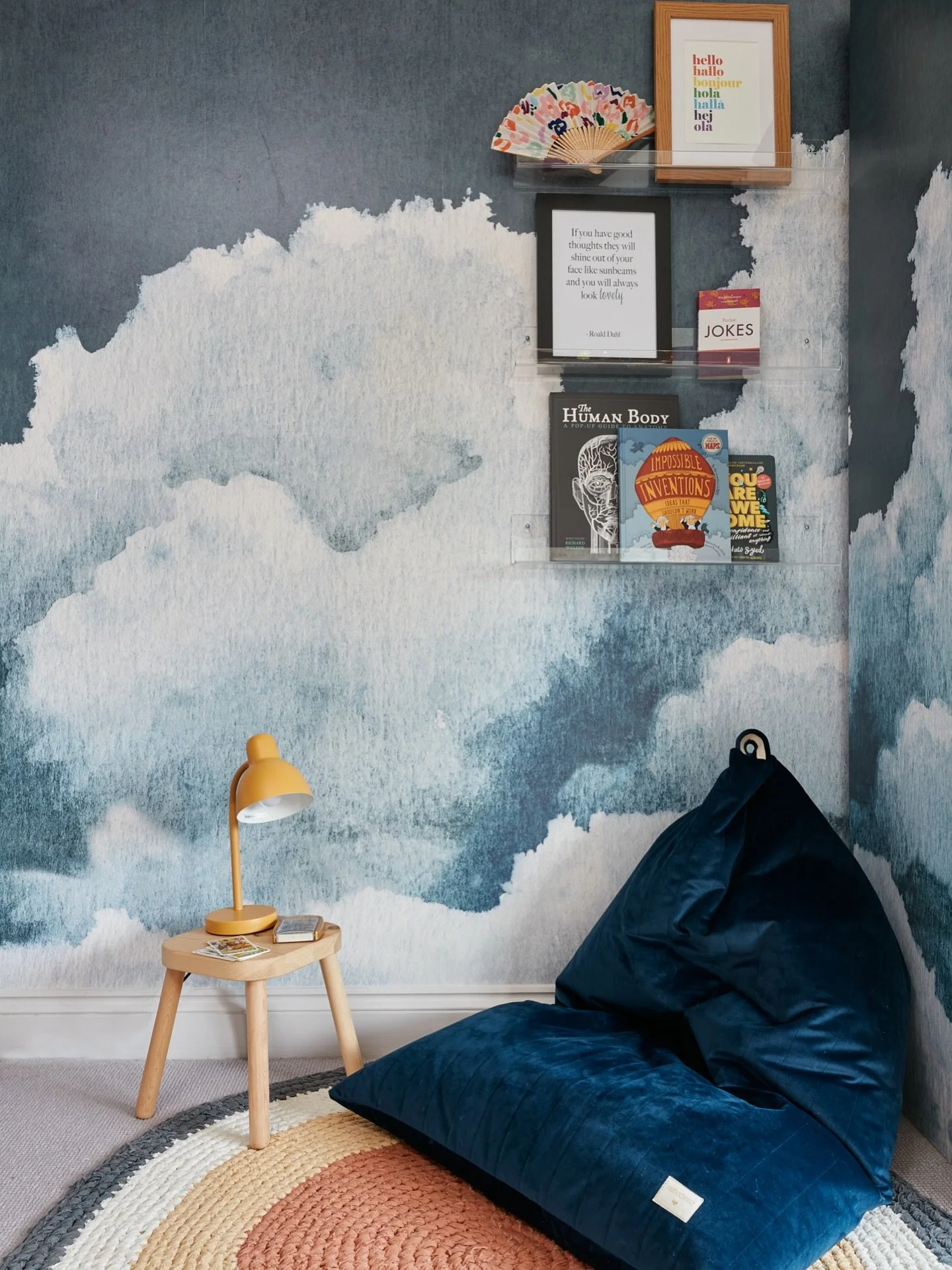A world of pure imagination awaits &hellip; ☁️📚. #readingcorner #storytimecorner #readingspace #bookcornerdesign #dreamydesigns #bluepouf #colourfulrug