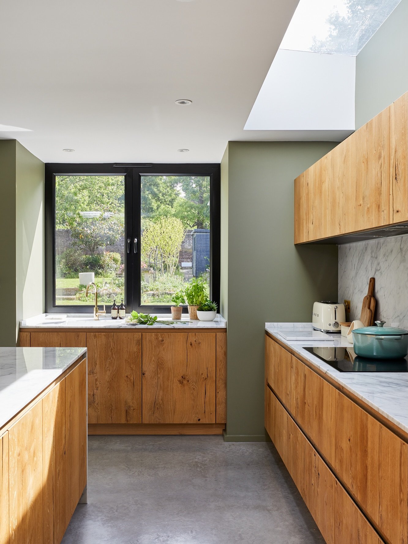 Where nature meets design - nothin competes, everything connects 🌿

We&rsquo;ve used warm wood, soft stone and earthy tones to ground the space and create a calm, open feel.

#earthytones #kitchenisland #marblecountertops #woodencupboard #kitchendes