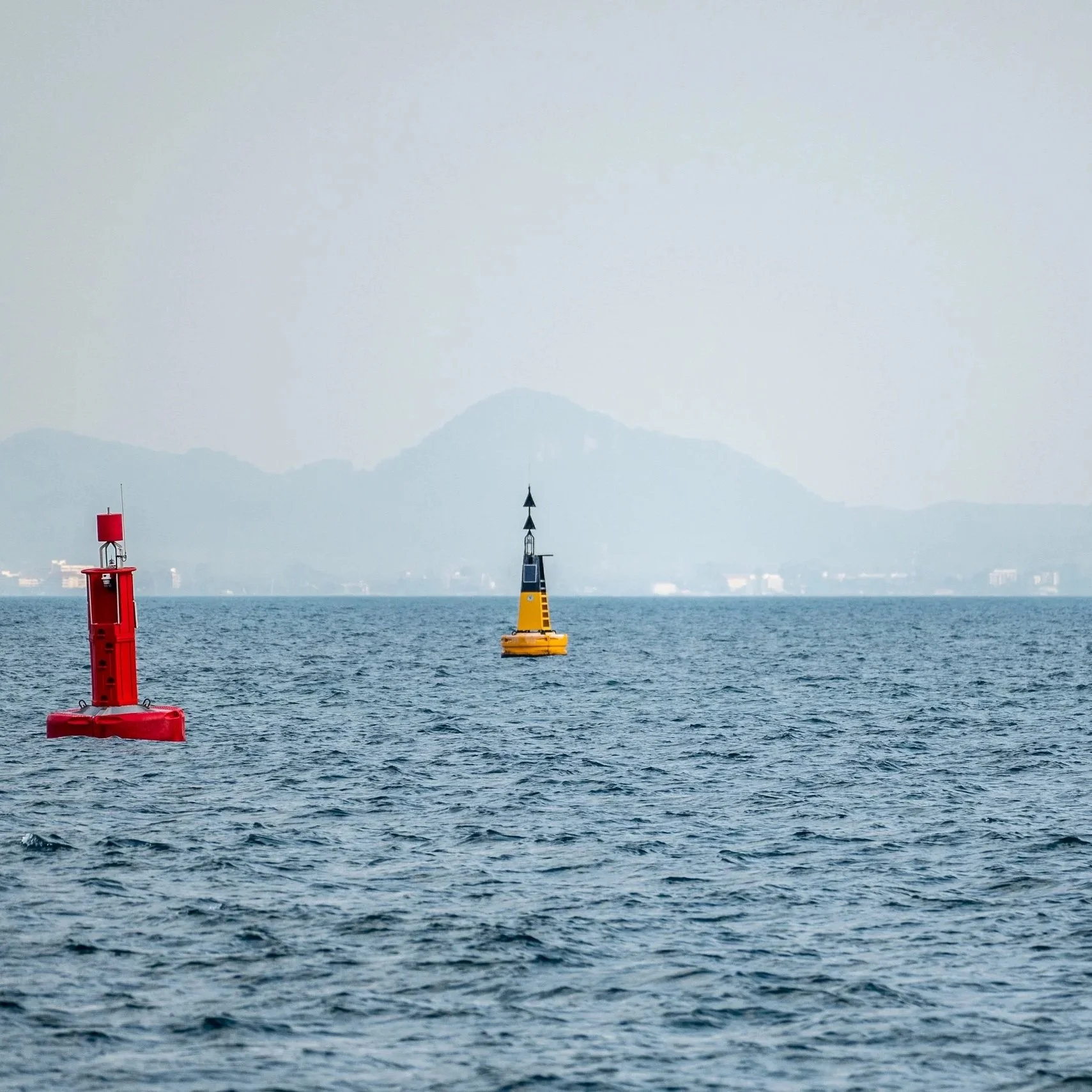 floating-red-navigational-buoy-blue-sea-marine-signal-buoy-navigational-buoy-marking-shipping-channel.jpg
