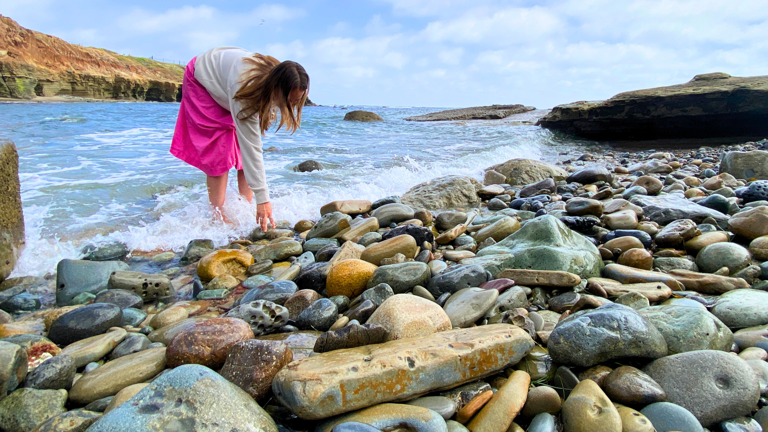 Visitor explores the Intertidal Zone at Cabrillo National Monument. Photo credit: Peggy Junker.