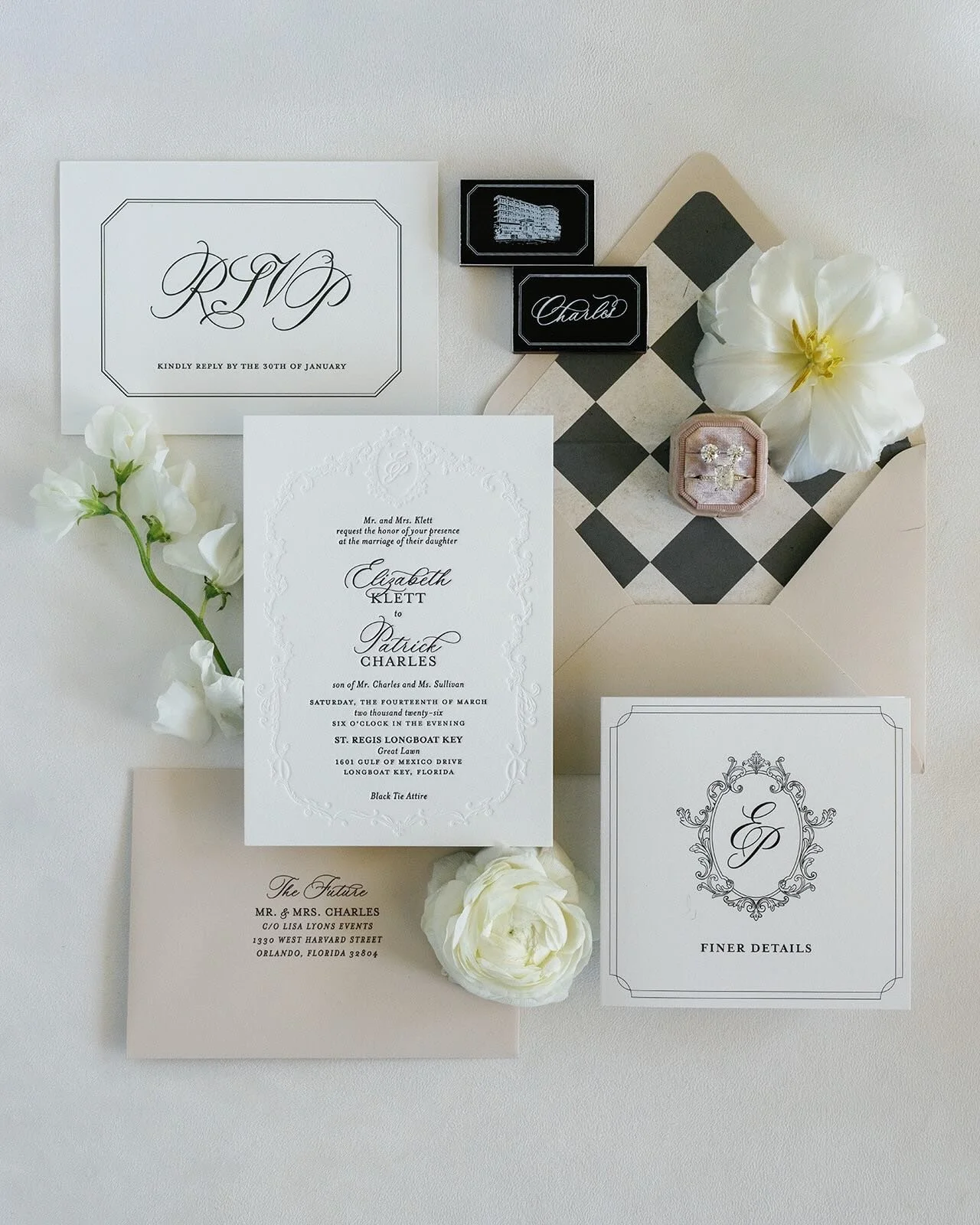 For Liz &amp; Patrick, every detail was designed to feel timeless, tailored, and unmistakably theirs.

From their custom crest and letterpress invitation suite to a hand-drawn venue illustration, gallery wall seating display, custom matchboxes, menus