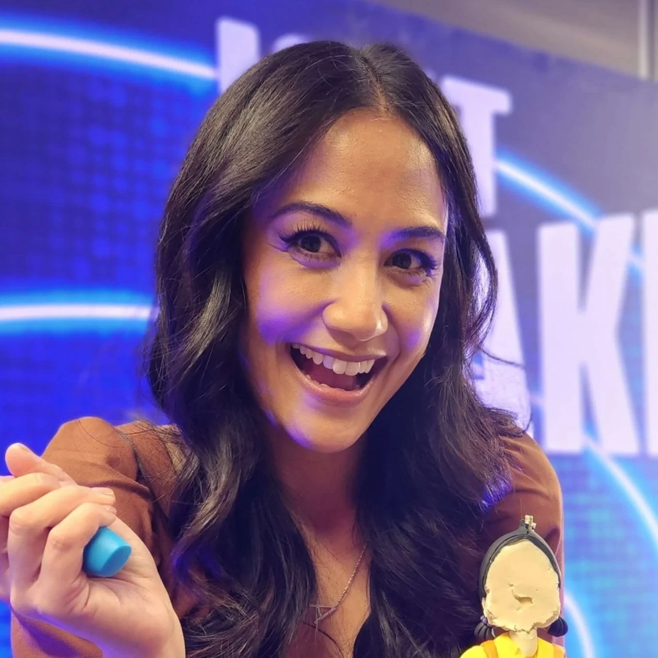 April Julian with Squid Game Doll Cake.jpg