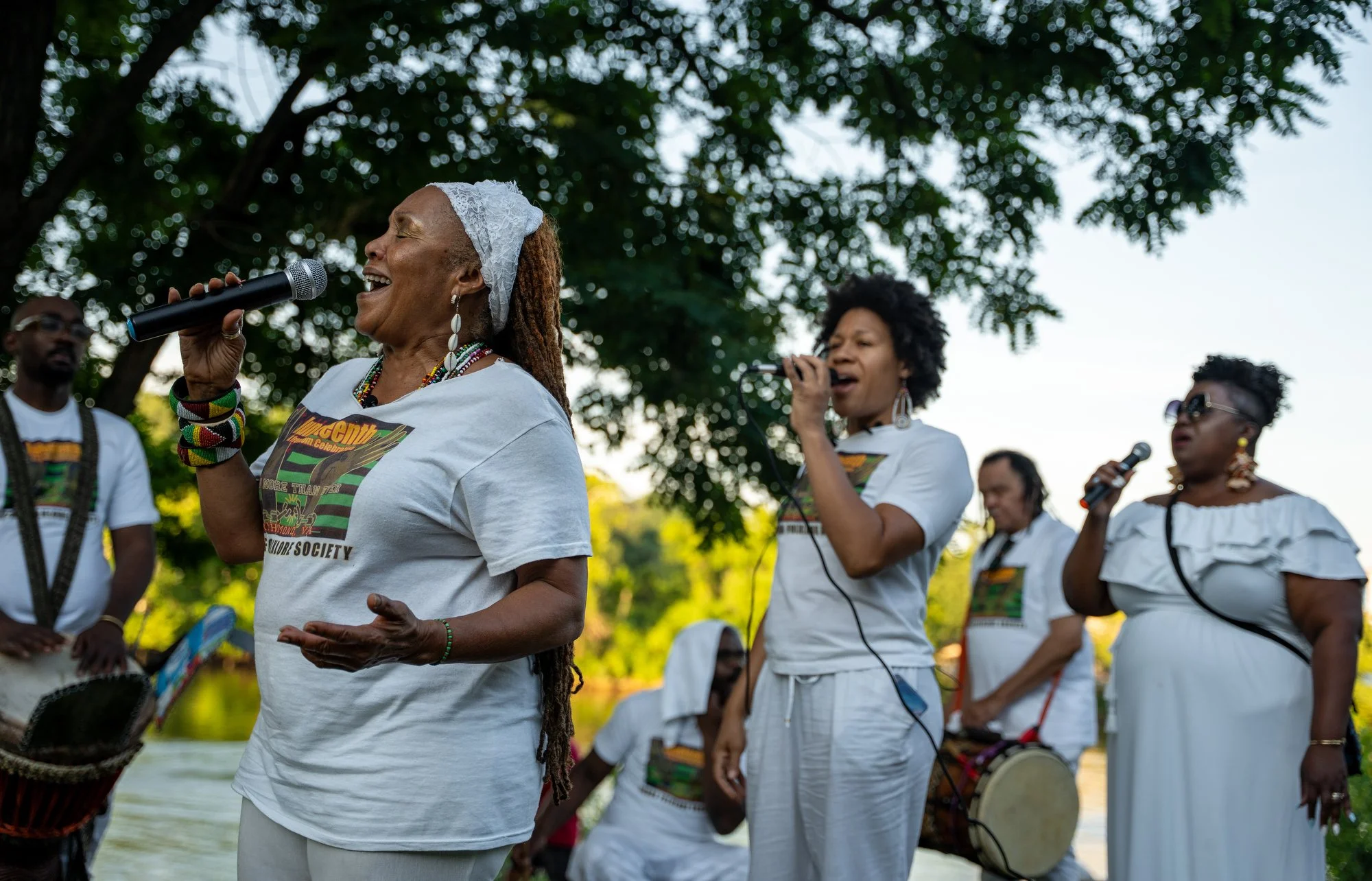 Janine Bell of the Elegba Folklore Society hosts the Torch Lit Night Walk Along the Trail of Enslaved Africans and sings traditional songs throughout the evening during the Juneteenth event on Saturday, June 13, 2026, in Richmond, Va.