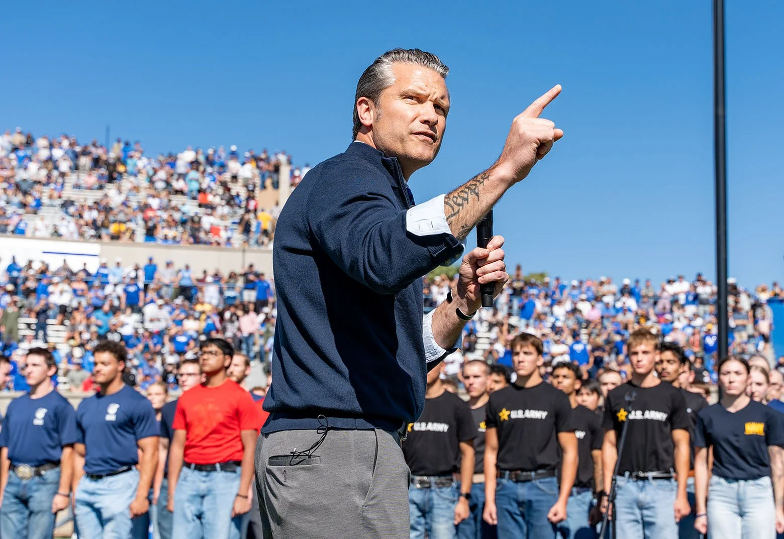 Secretary of War Pete Hegseth swears in members of the armed forces during halftime of the U.S. Air Force-Navy football game Saturday, Oct. 3, 2026.