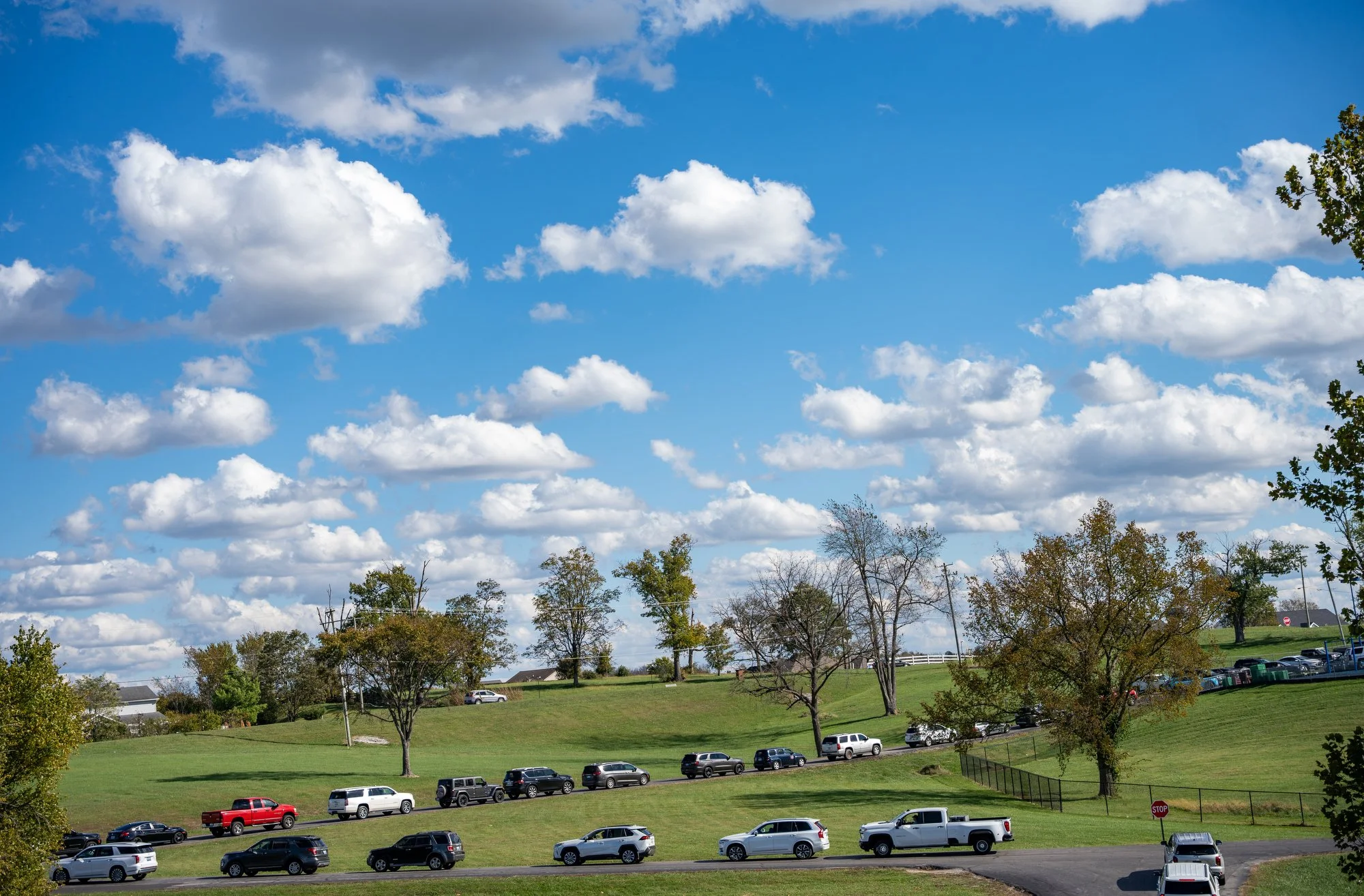 A line of cars forms outside Mason County Schools as the 3 p.m. dismissal approaches in Maysville, Ky., Oct. 21, 2025.