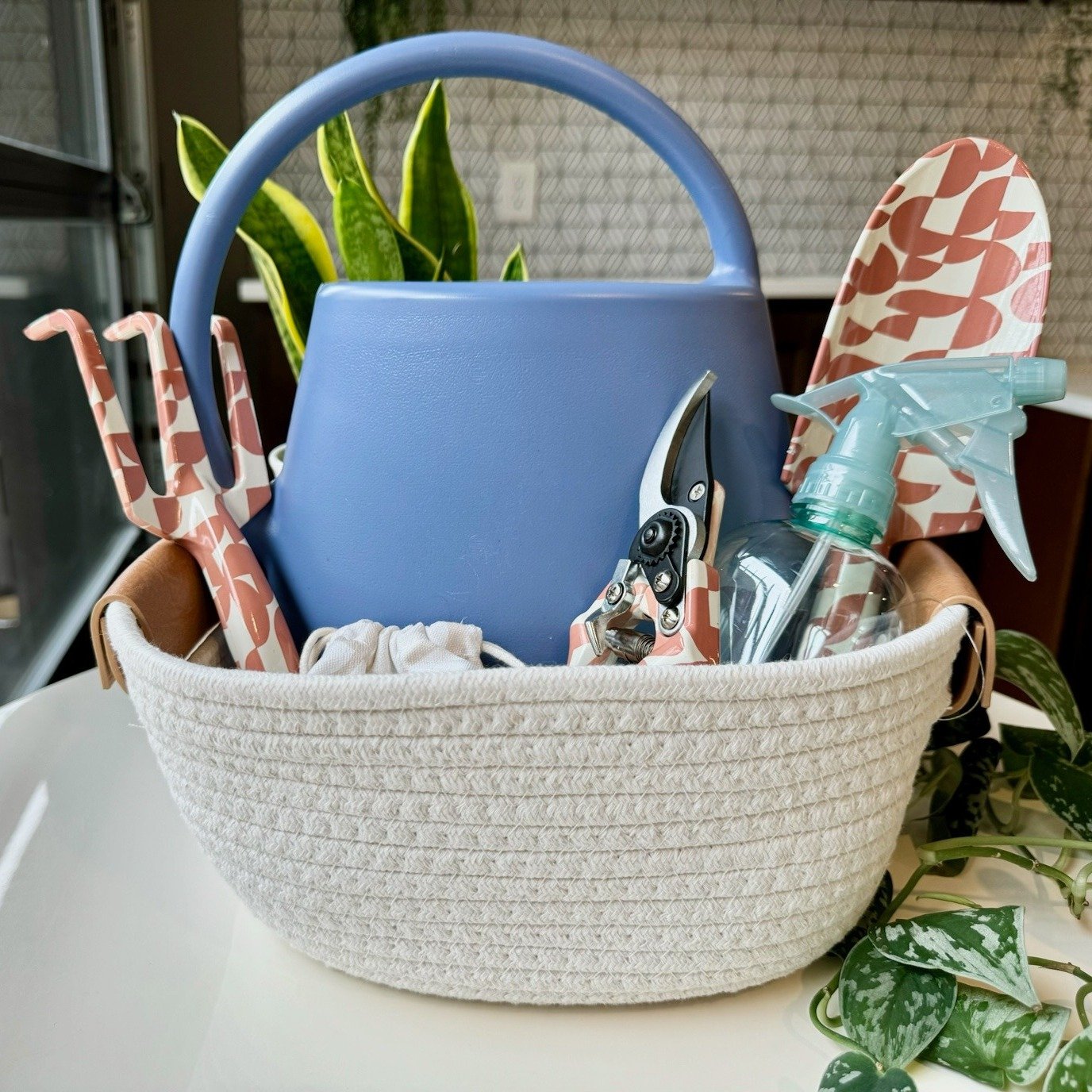 It's giveaway time! We're giving away a gardening basket, perfect for the plant parents or balcony gardeners! This basket includes a watering can, a mister, pruning shears, gardening tools, and more. Here's how to enter:

- You must be a current or f