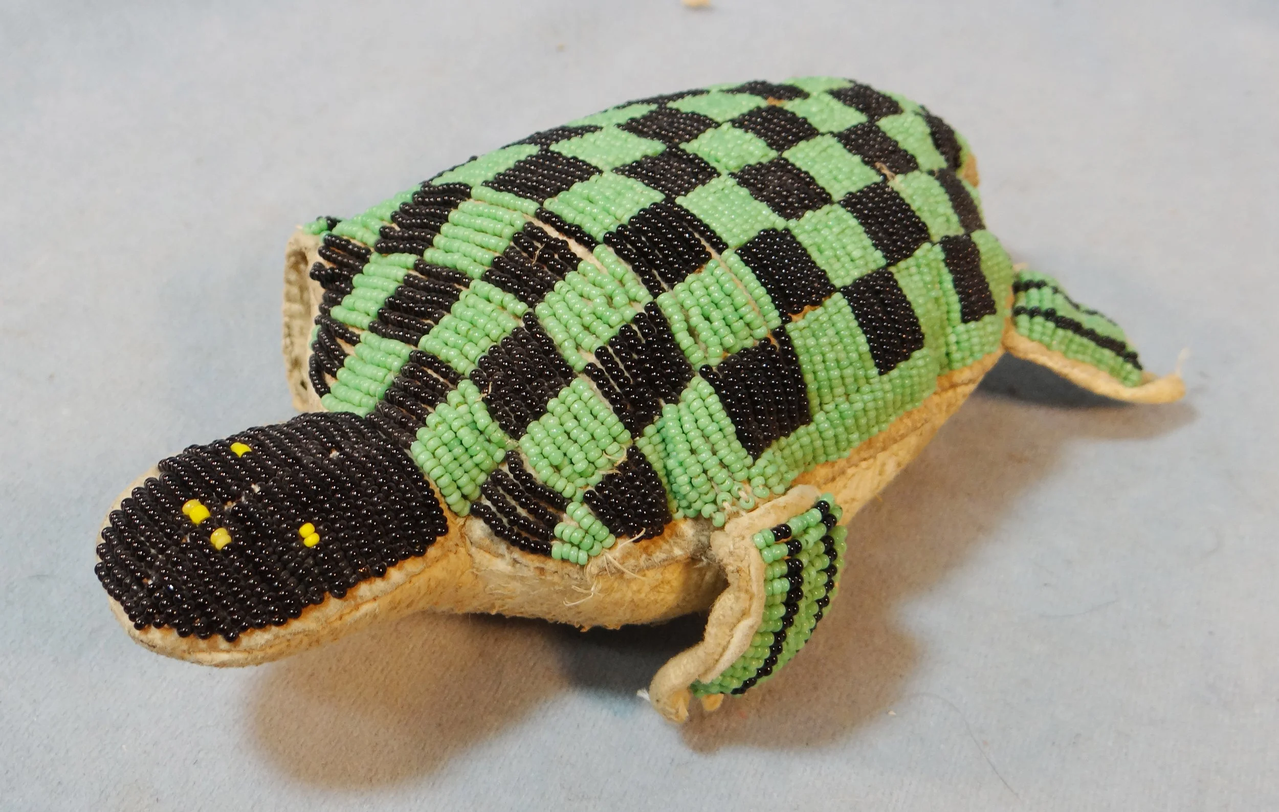 Beaded turtle umbilical fetish, 7" x 3"
