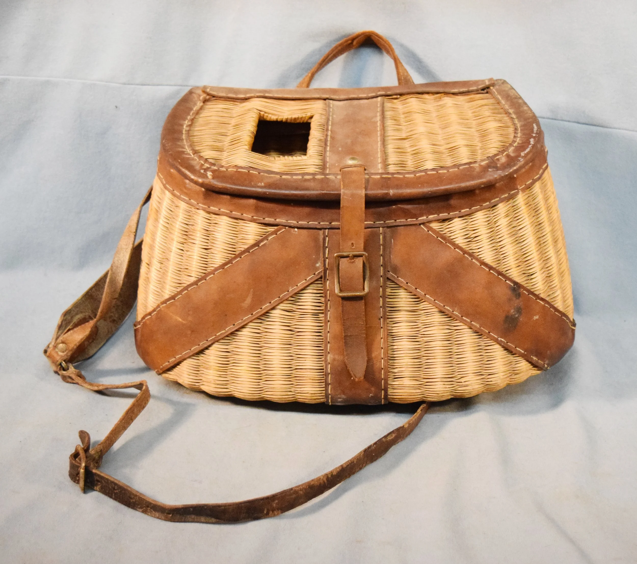 Crushed bamboo fishing creel with shoulder harness