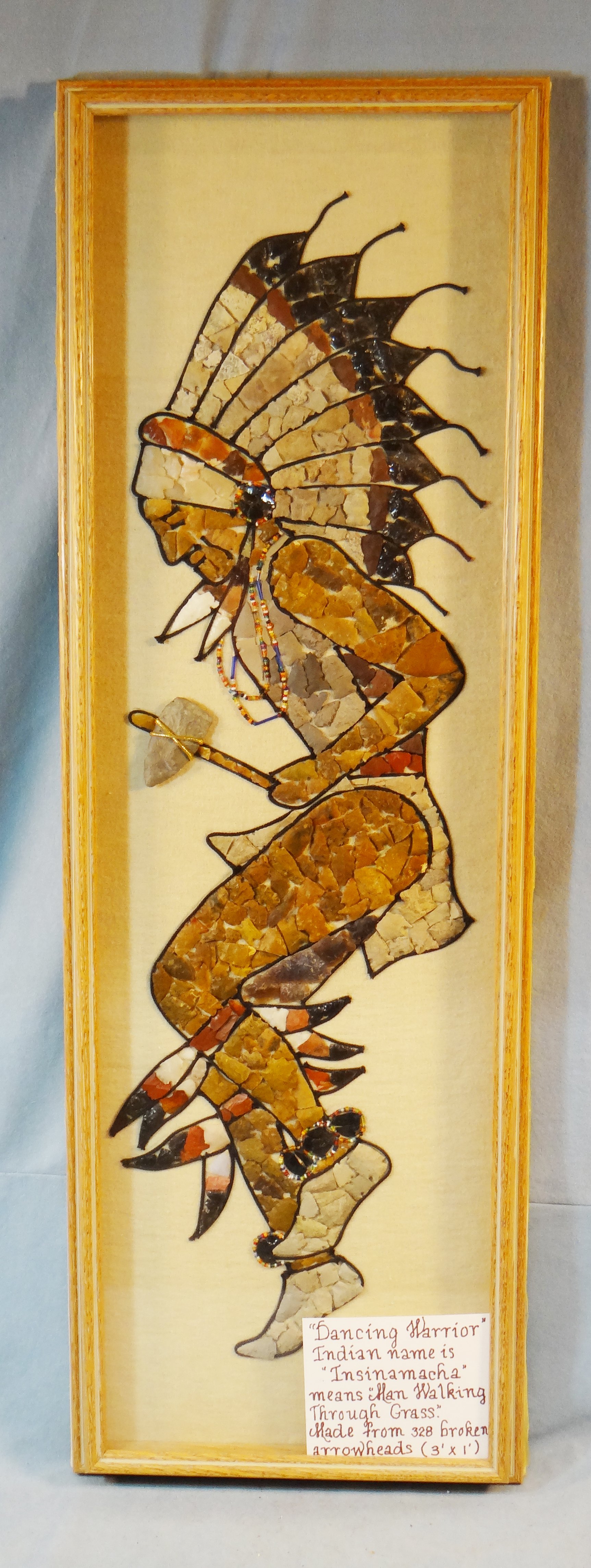 Blackfeet Indian Dancer framed image made of arrowhead parts/pcs., all Northern Plains finds, 328 pcs., image is 10" w x 31" t, all original colors, frame measures 12" x 36"
