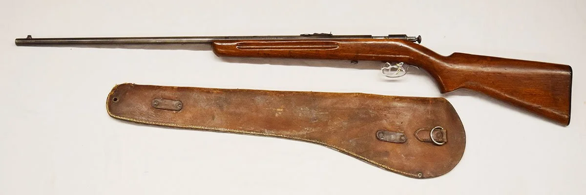 Winchester Model 67, .22 rifle, S, L & LR, 27" round bbl, single shot w/leather rifle scabbard, unmarked
