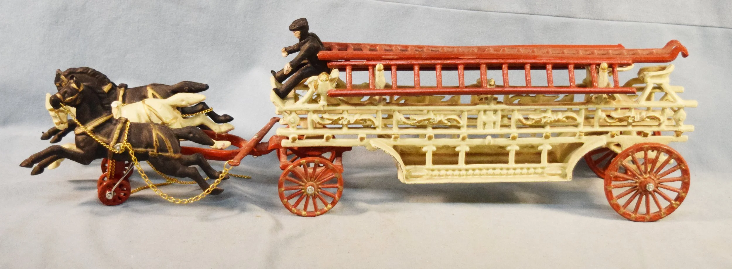 Vintage cast iron horse drawn fire wagon, 8.5" x 27.5" x 6.5"
