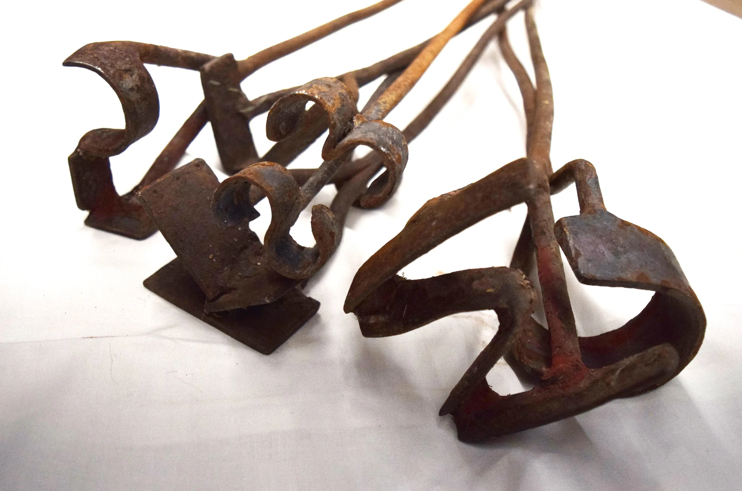 (7) hand forged branding irons: S, K, W, L, S3, U, 5