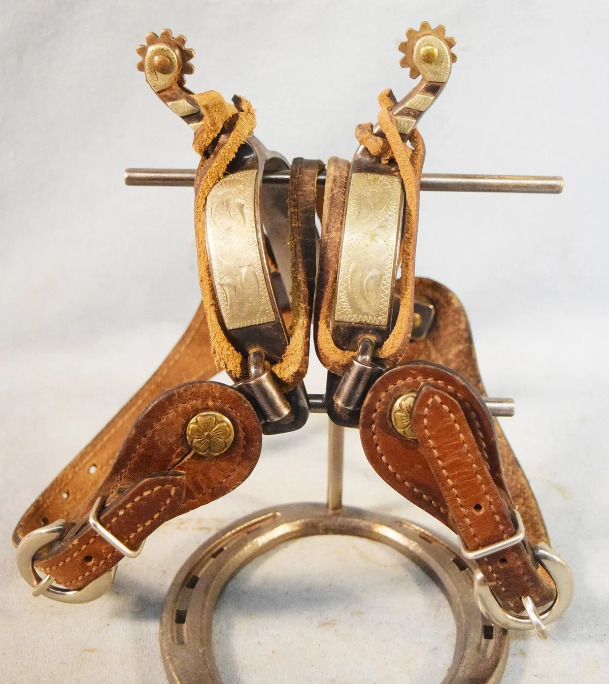 Unmarked silver mounted spurs
