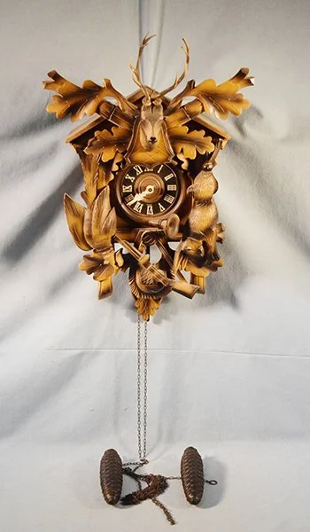 Regula German cuckoo clock, 20" x 14" x 9", with weights, working condition
