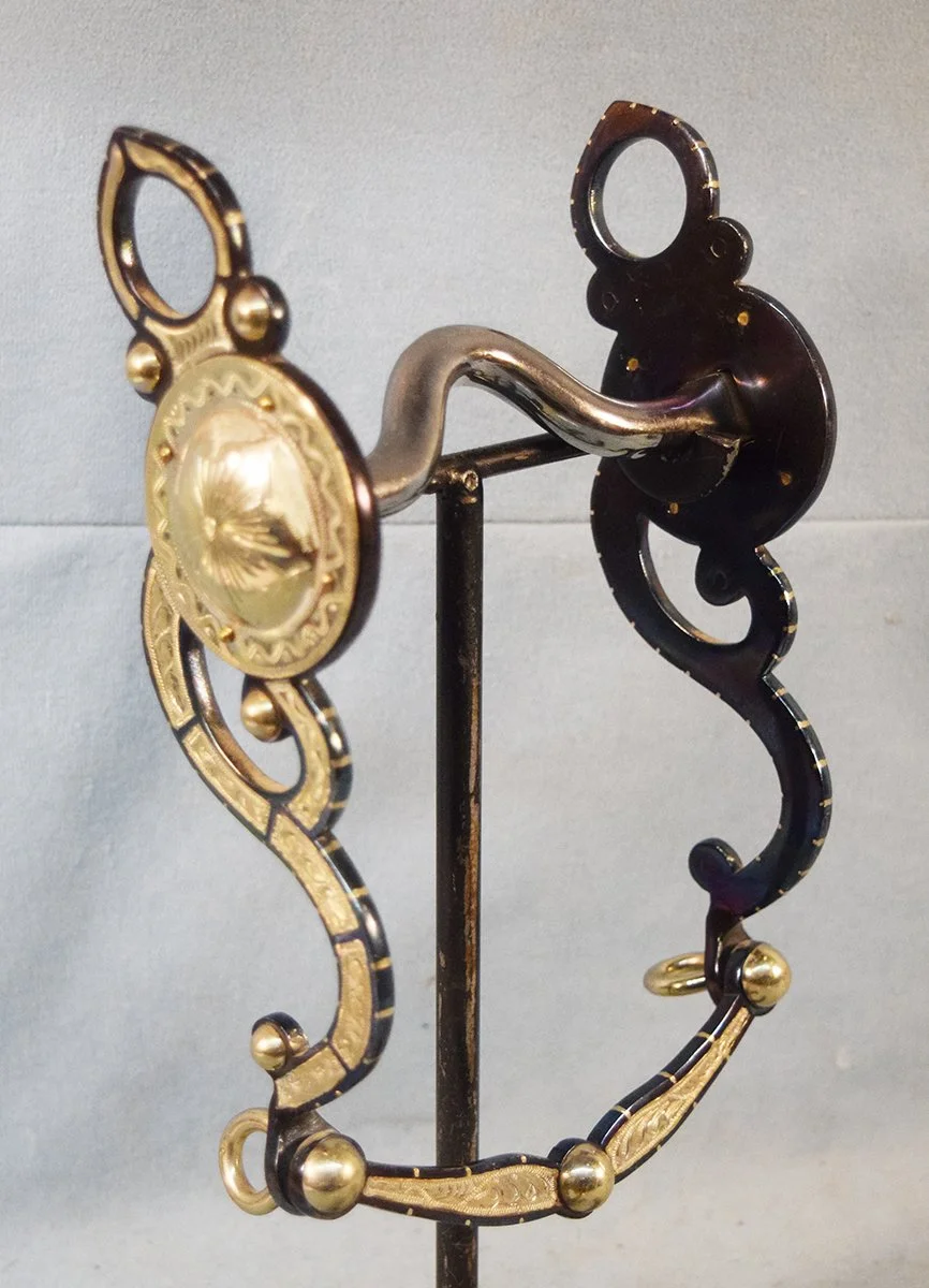 Unmarked silver inlaid curb bit
