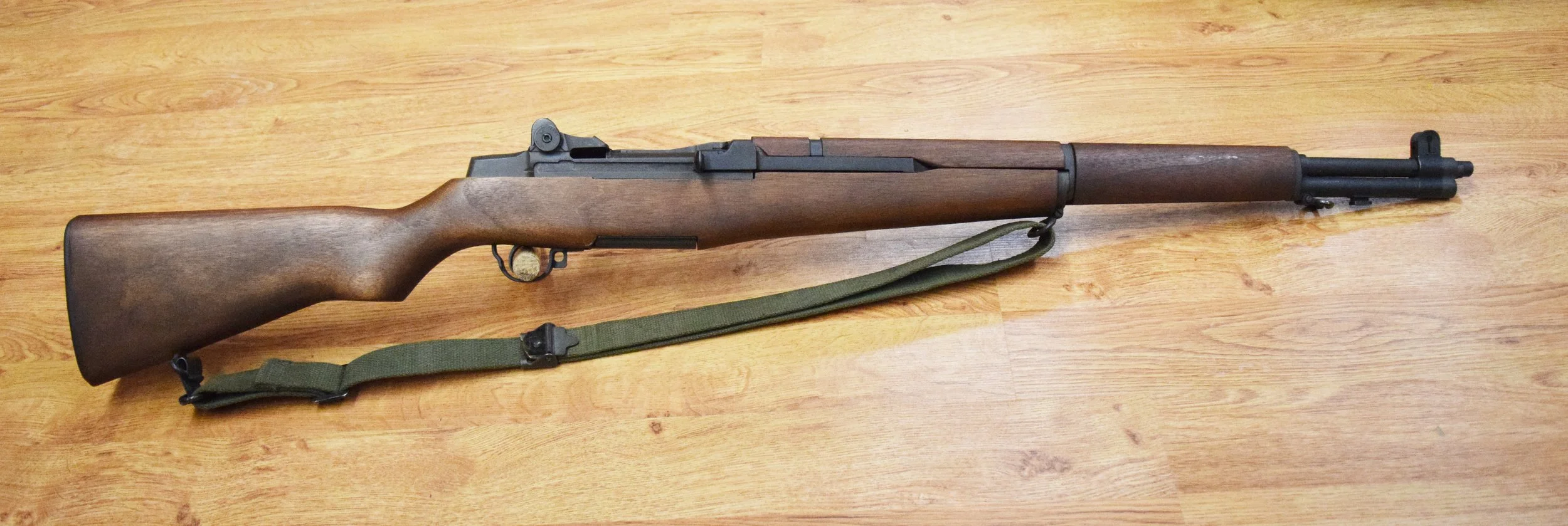Springfield Armory (Geneseo, IL) M1 Garand semi-auto rifle. .30-06, recent-production commercial version of issued US Rifle M1, s# 7100347, nylon web sling