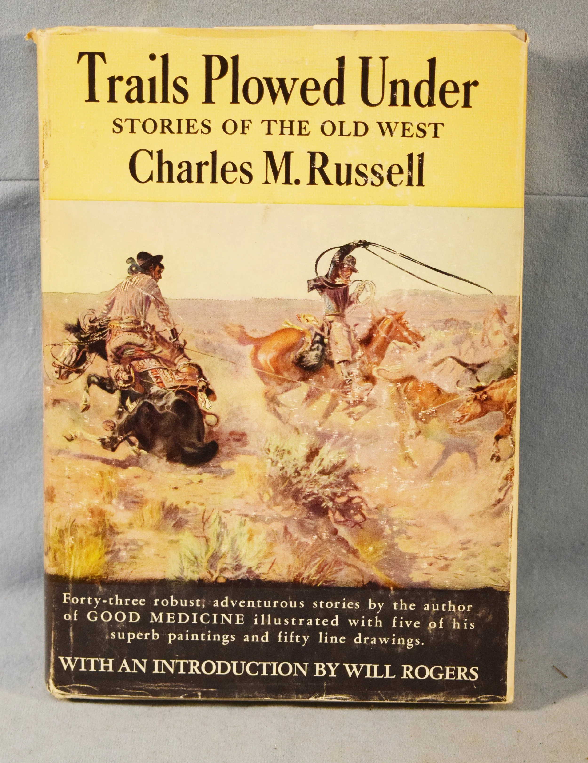 Russell, Charles M. book, Trails Plowed Under, dust jacket, 1927 Doubleday